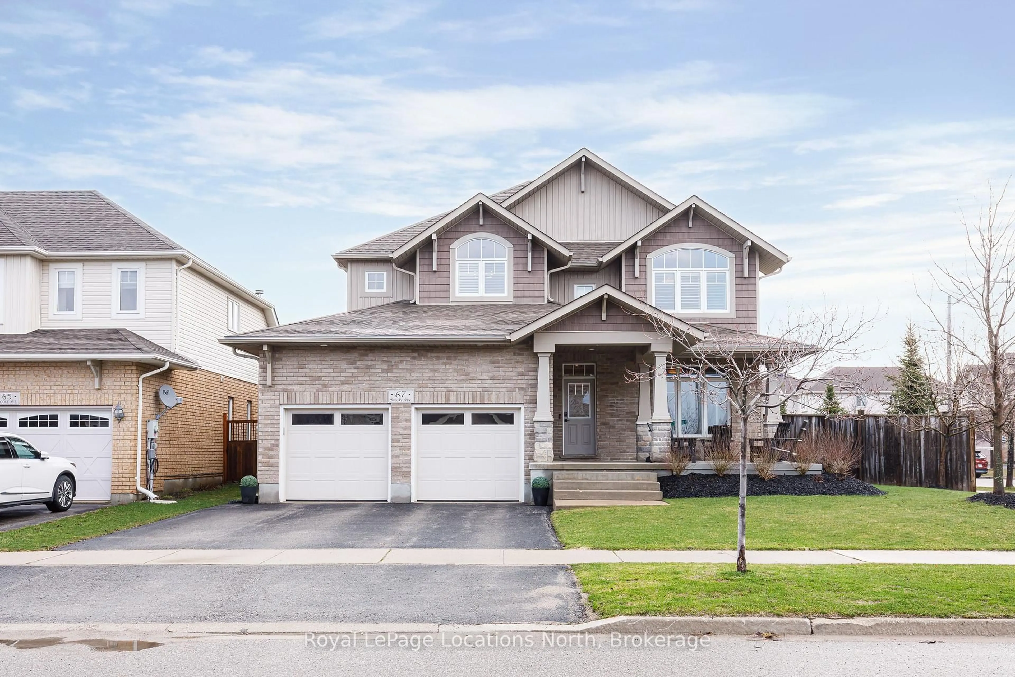 Home with brick exterior material, street for 67 Brooke Ave, Collingwood Ontario L9Y 0C5