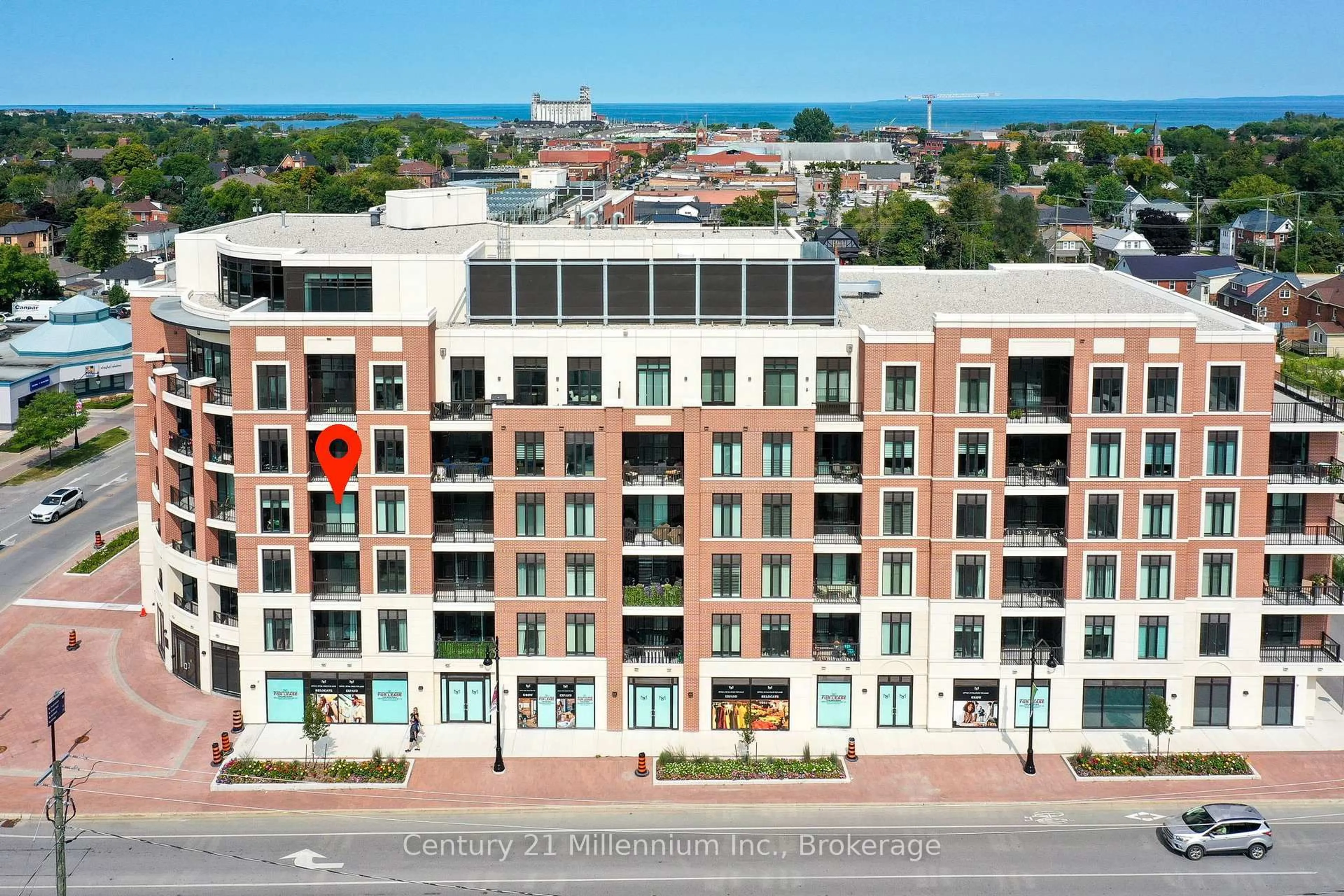A pic from outside/outdoor area/front of a property/back of a property/a pic from drone, city buildings view from balcony for 1 Hume St #410, Collingwood Ontario L9Y 0X3