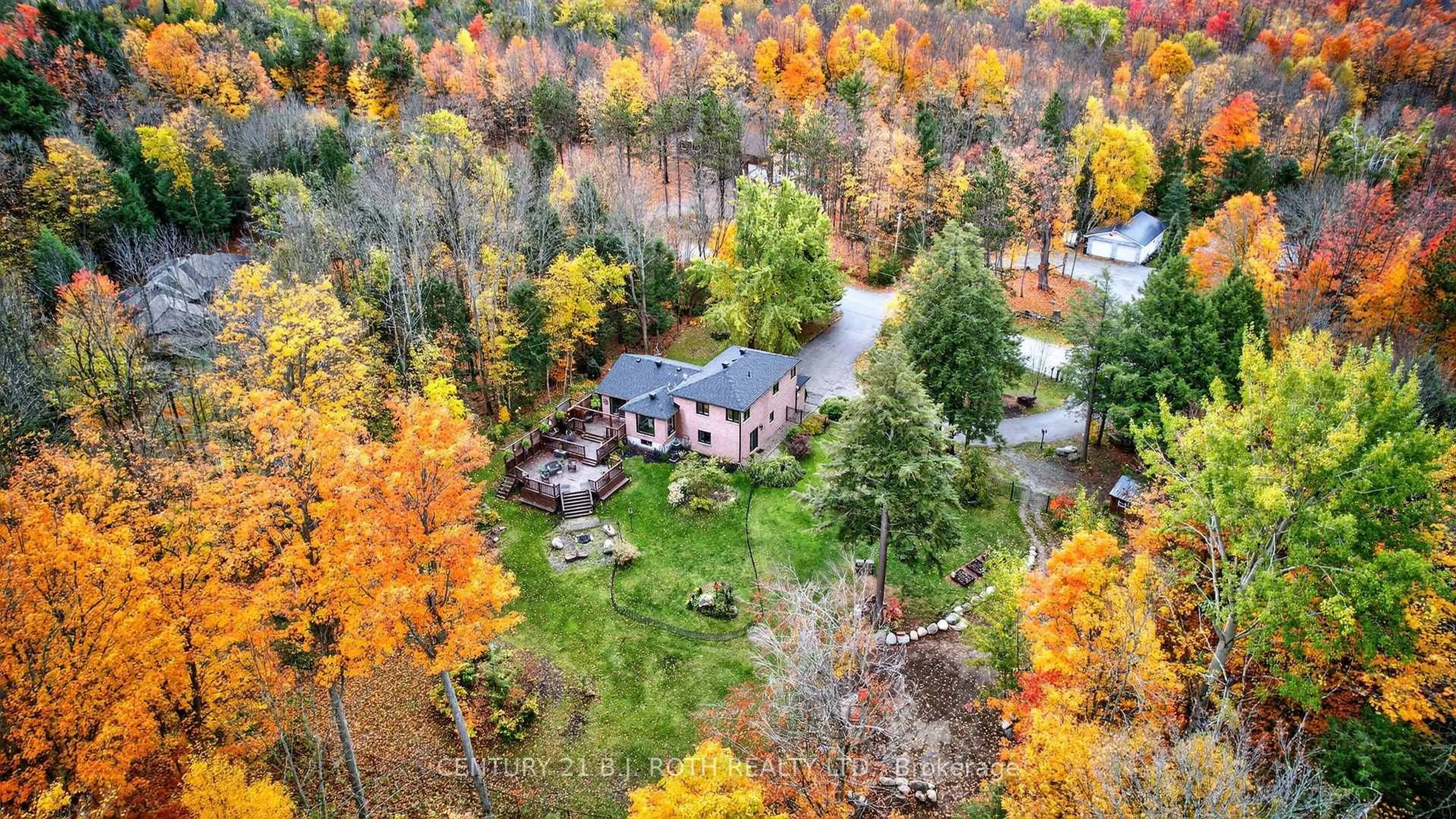 A pic from outside/outdoor area/front of a property/back of a property/a pic from drone, forest/trees view for 4737 12 Line, Oro-Medonte Ontario L0K 1E0