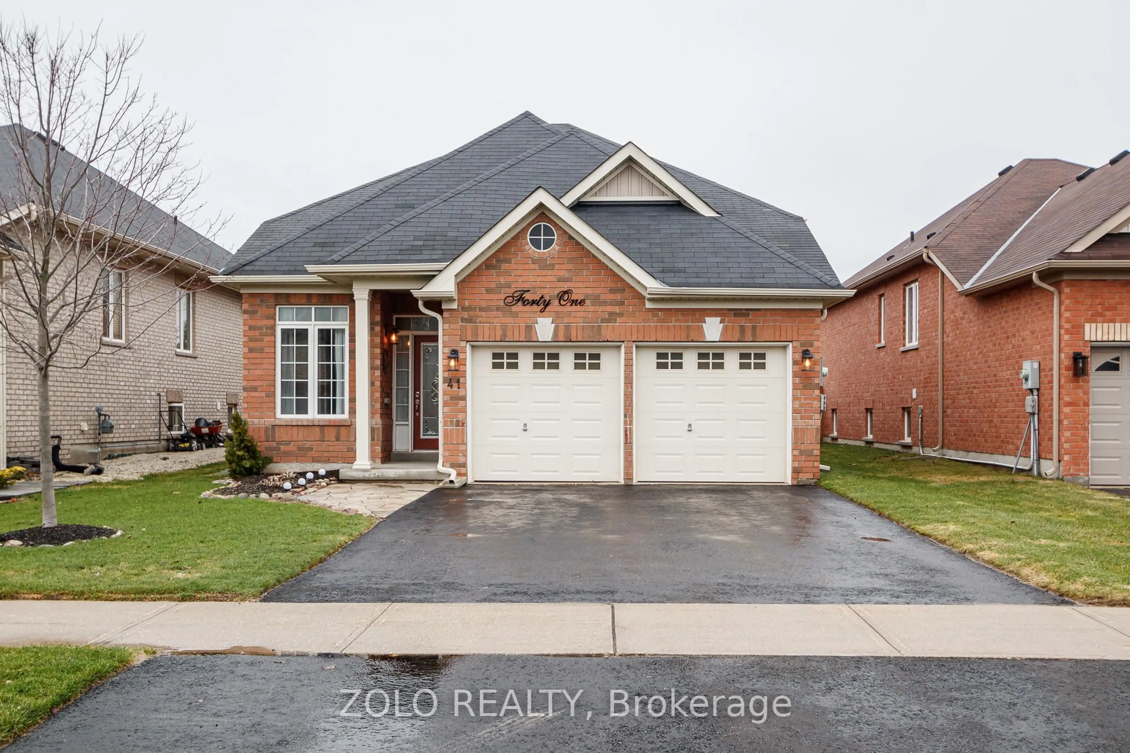 Home with brick exterior material, street for 41 Middleton Dr, Wasaga Beach Ontario L9Z 0G8