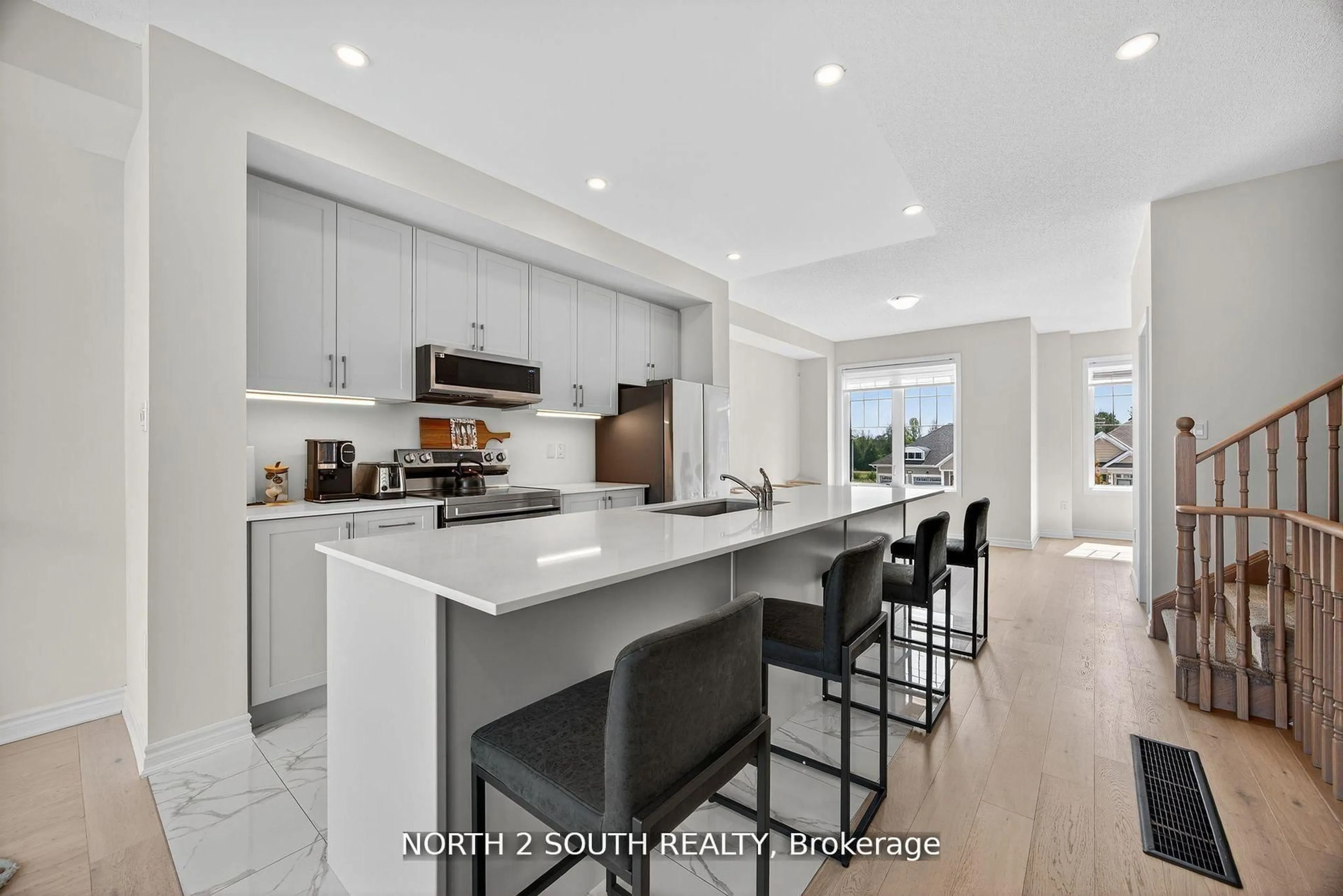 Open concept kitchen, ceramic/tile floor for 24 Abby Dr, Wasaga Beach Ontario L9Z 0K2