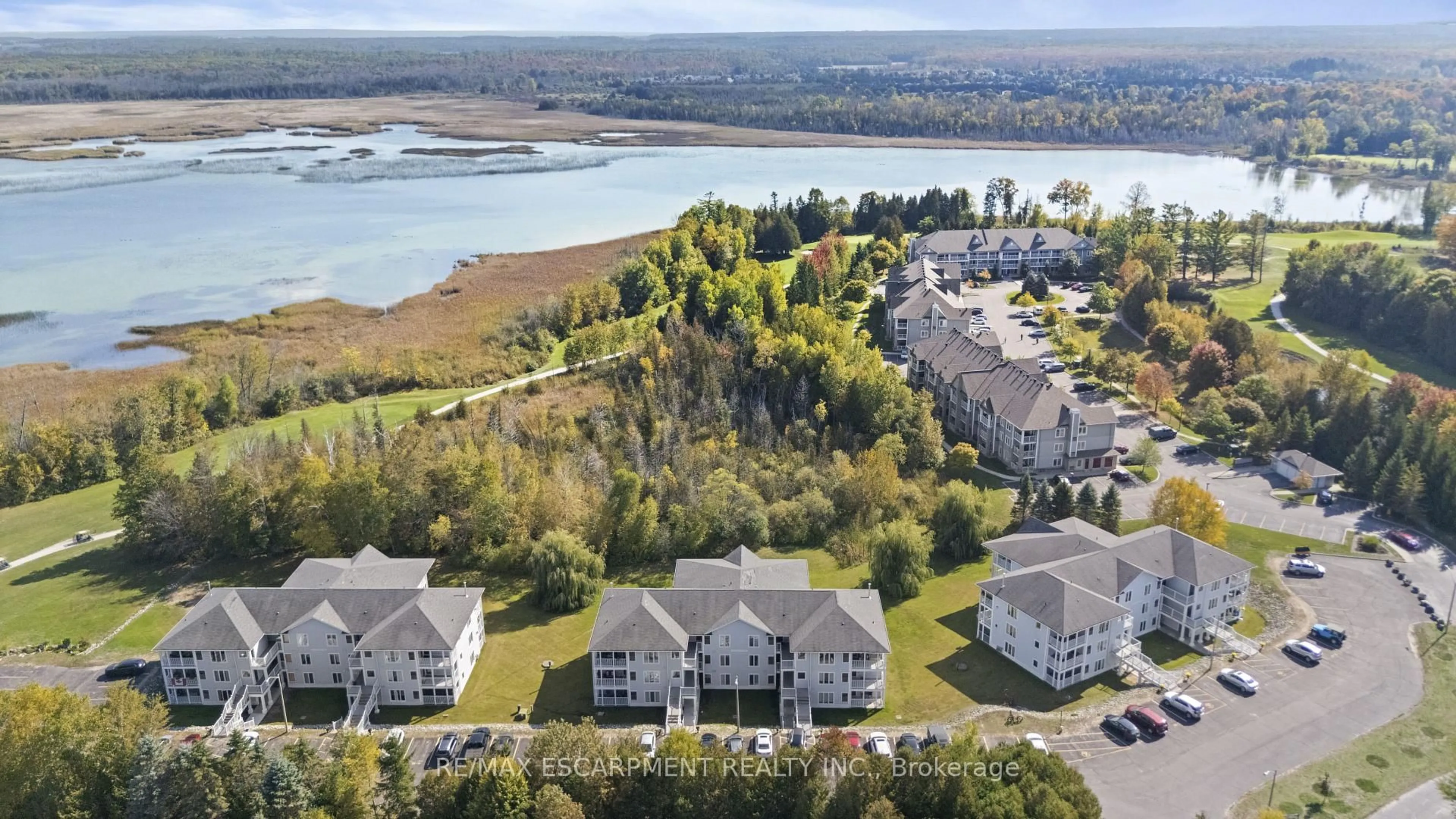 A pic from outside/outdoor area/front of a property/back of a property/a pic from drone, water/lake/river/ocean view for 20 Mulligan Lane #8, Wasaga Beach Ontario L9Z 1C4