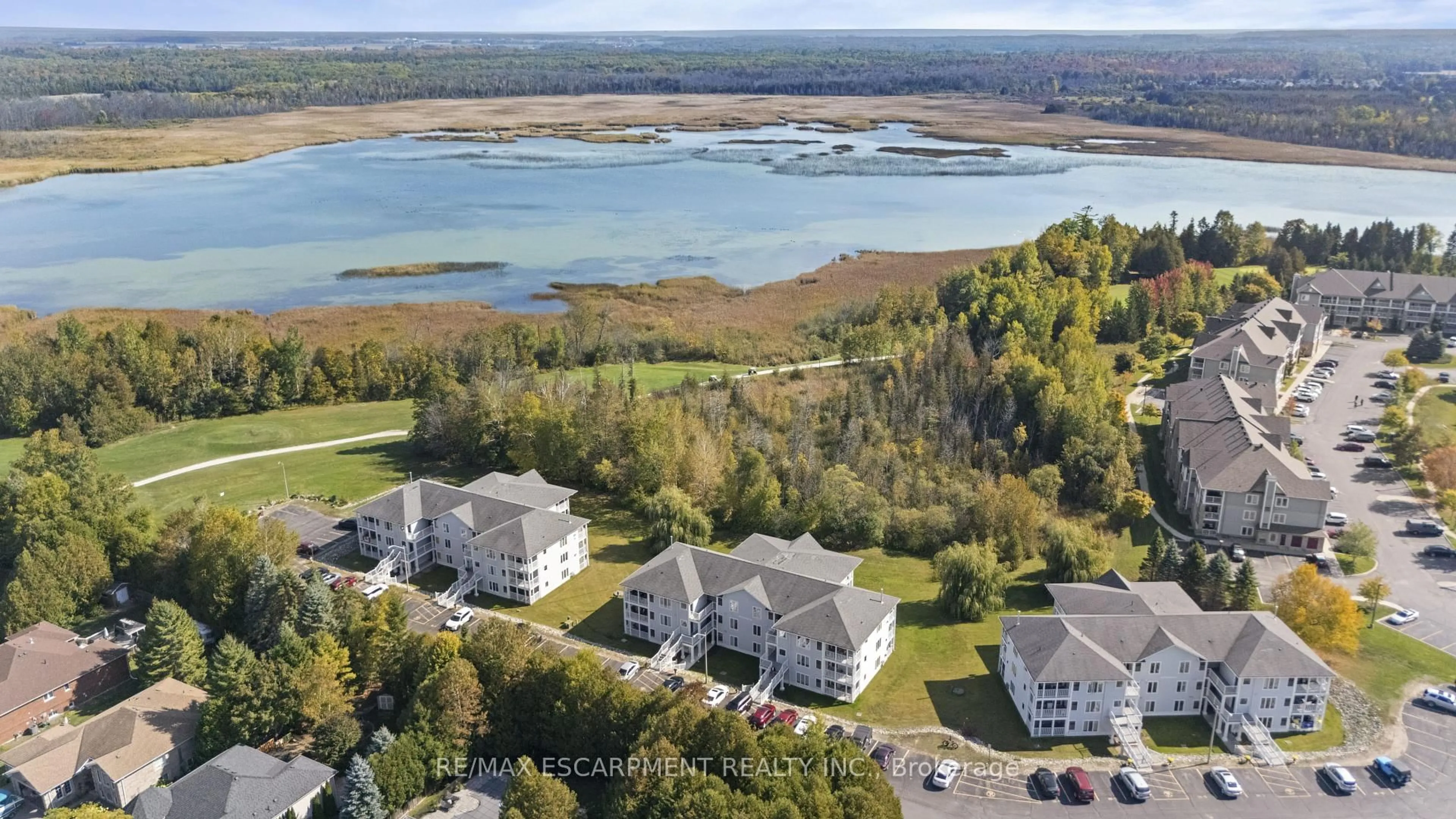 A pic from outside/outdoor area/front of a property/back of a property/a pic from drone, water/lake/river/ocean view for 20 Mulligan Lane #8, Wasaga Beach Ontario L9Z 1C4