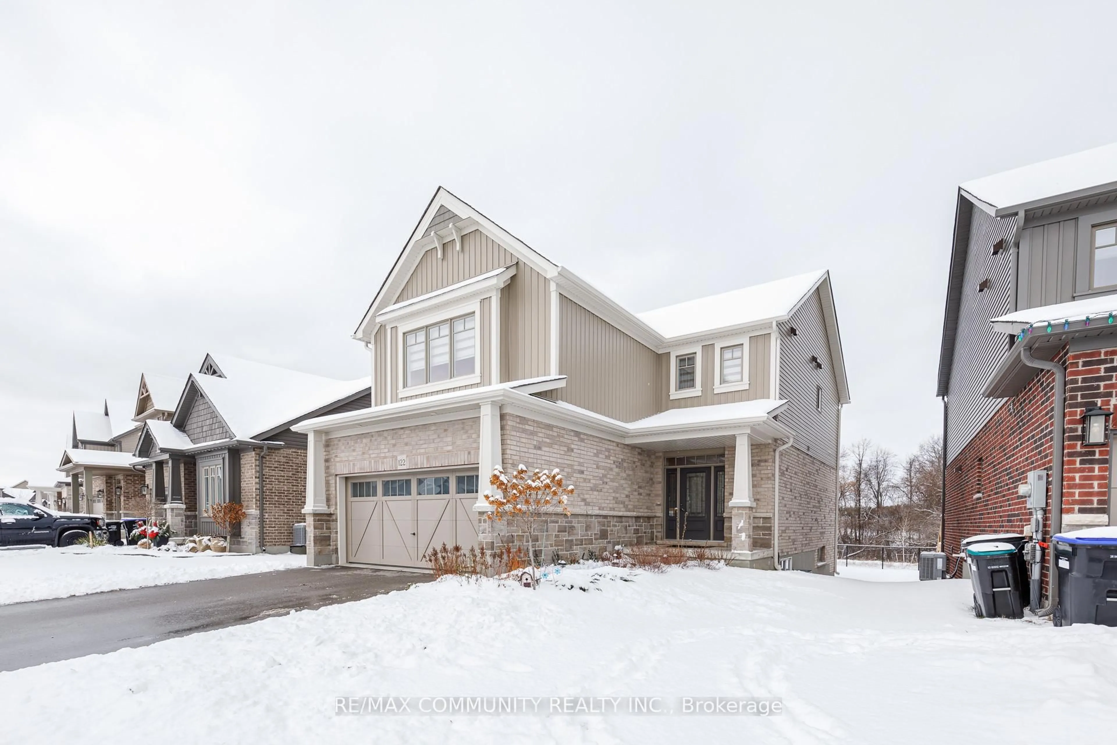 Home with brick exterior material, street for 122 Plewes Dr, Collingwood Ontario L9Y 5M4