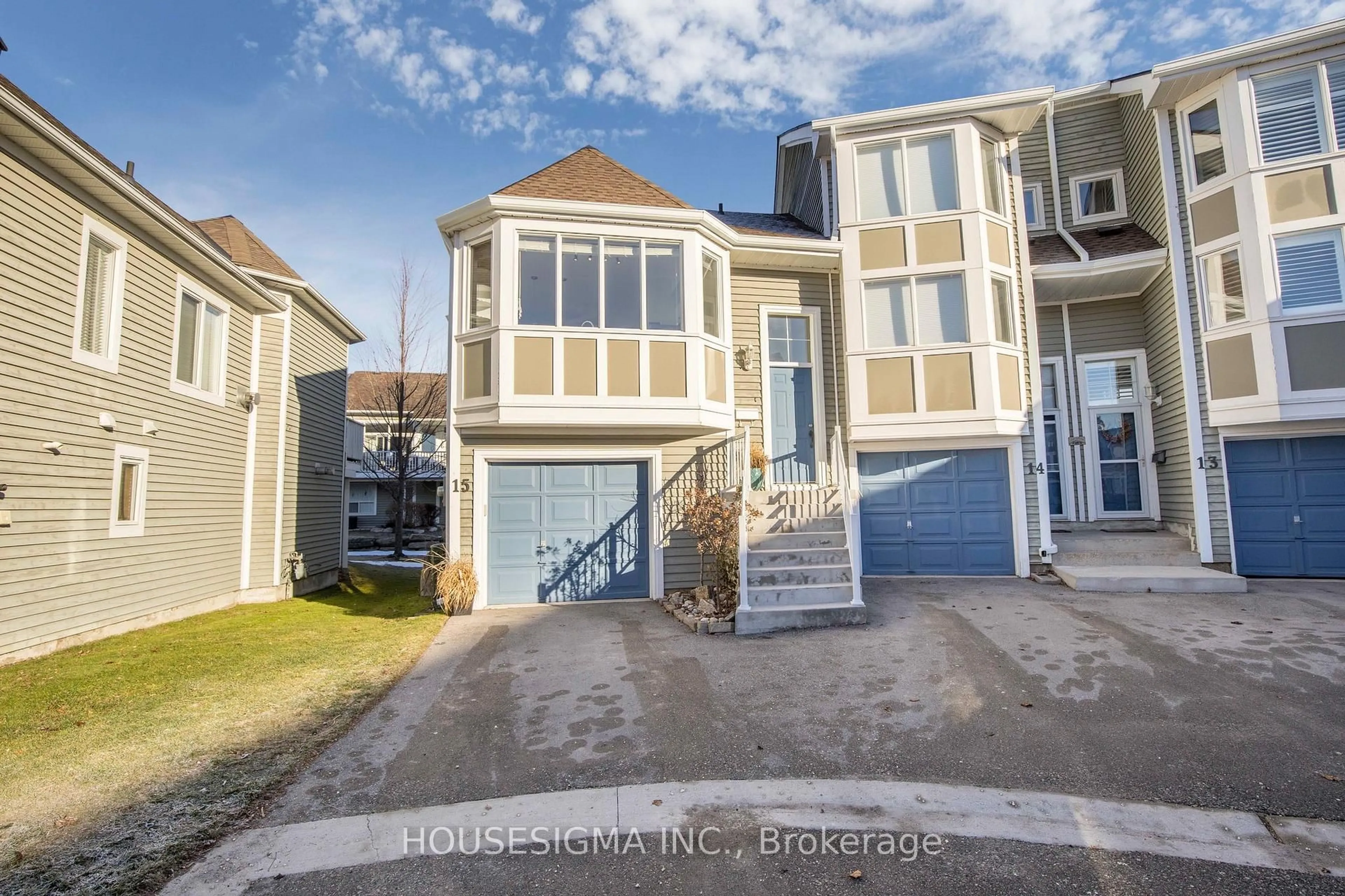 Home with vinyl exterior material, street for 15 Cranberry Quay #10, Collingwood Ontario L9Y 5C2