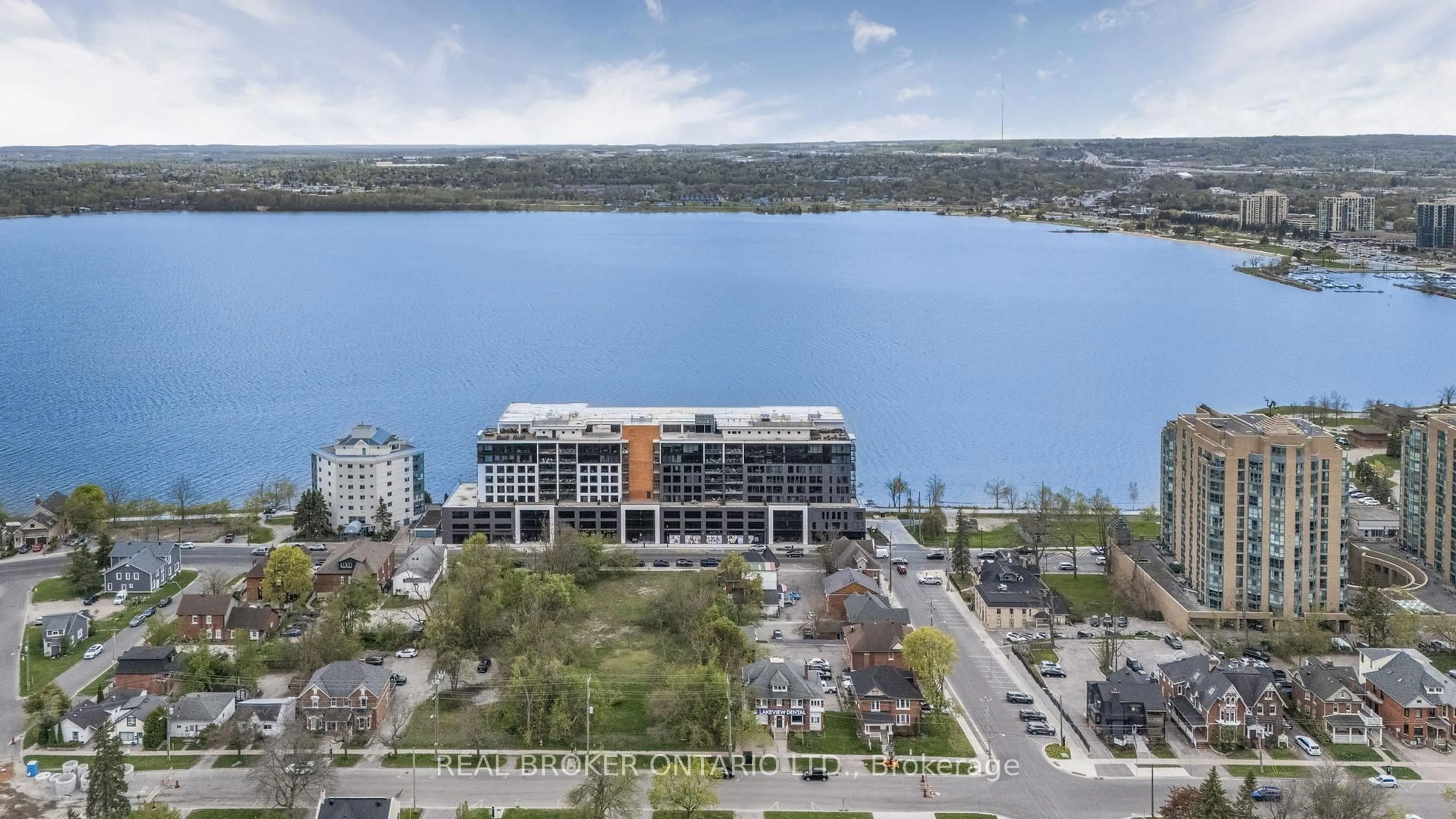 A pic from outside/outdoor area/front of a property/back of a property/a pic from drone, water/lake/river/ocean view for 185 Dunlop St #PH 3, Barrie Ontario L4M 0L7