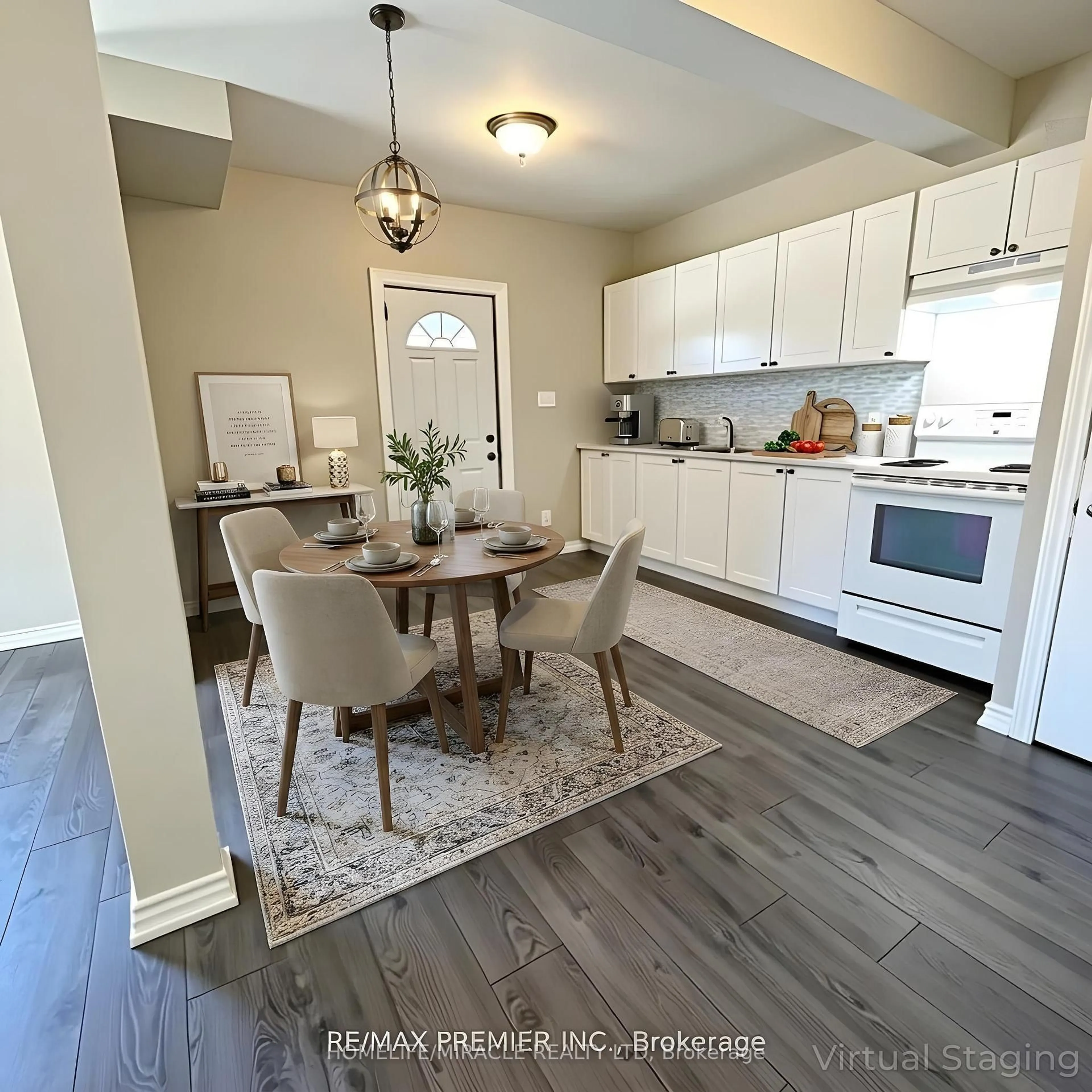 Open concept kitchen, wood/laminate floor for 143 Colborne St, Orillia Ontario L3V 5B8