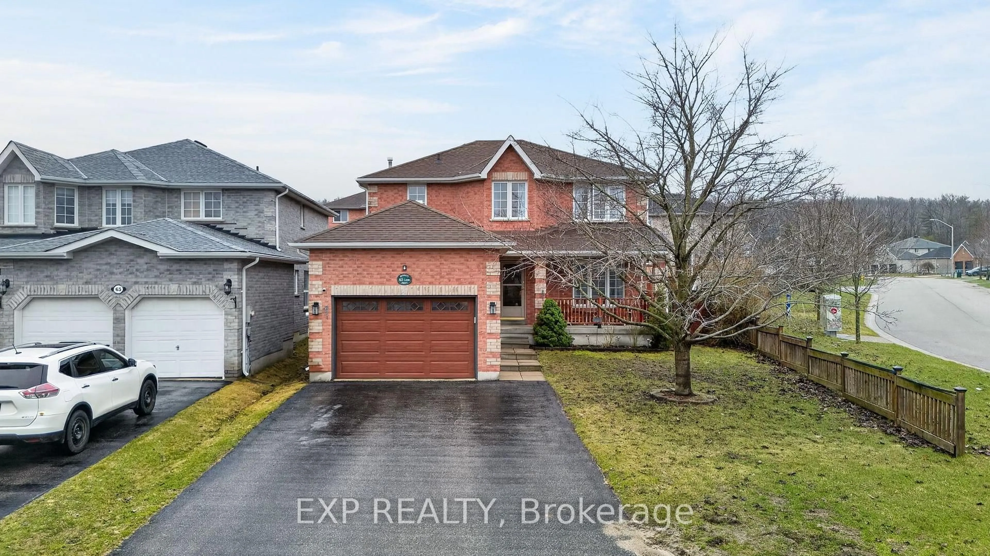 Home with brick exterior material, street for 65 Dunnett Dr, Barrie Ontario L4N 0J6