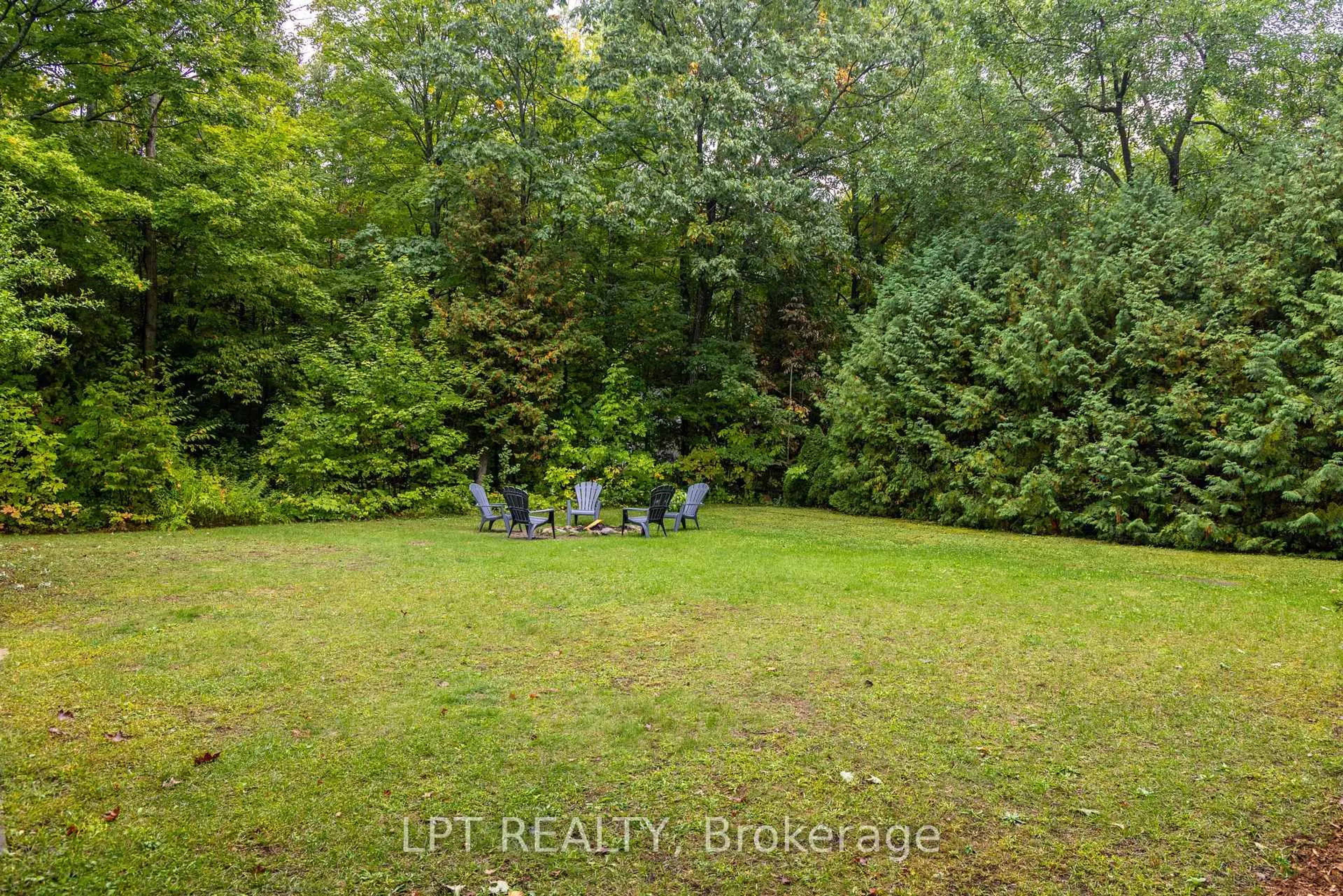 A pic from outside/outdoor area/front of a property/back of a property/a pic from drone, forest/trees view for 34 Staglir Dr, Tiny Ontario L9M 0H2
