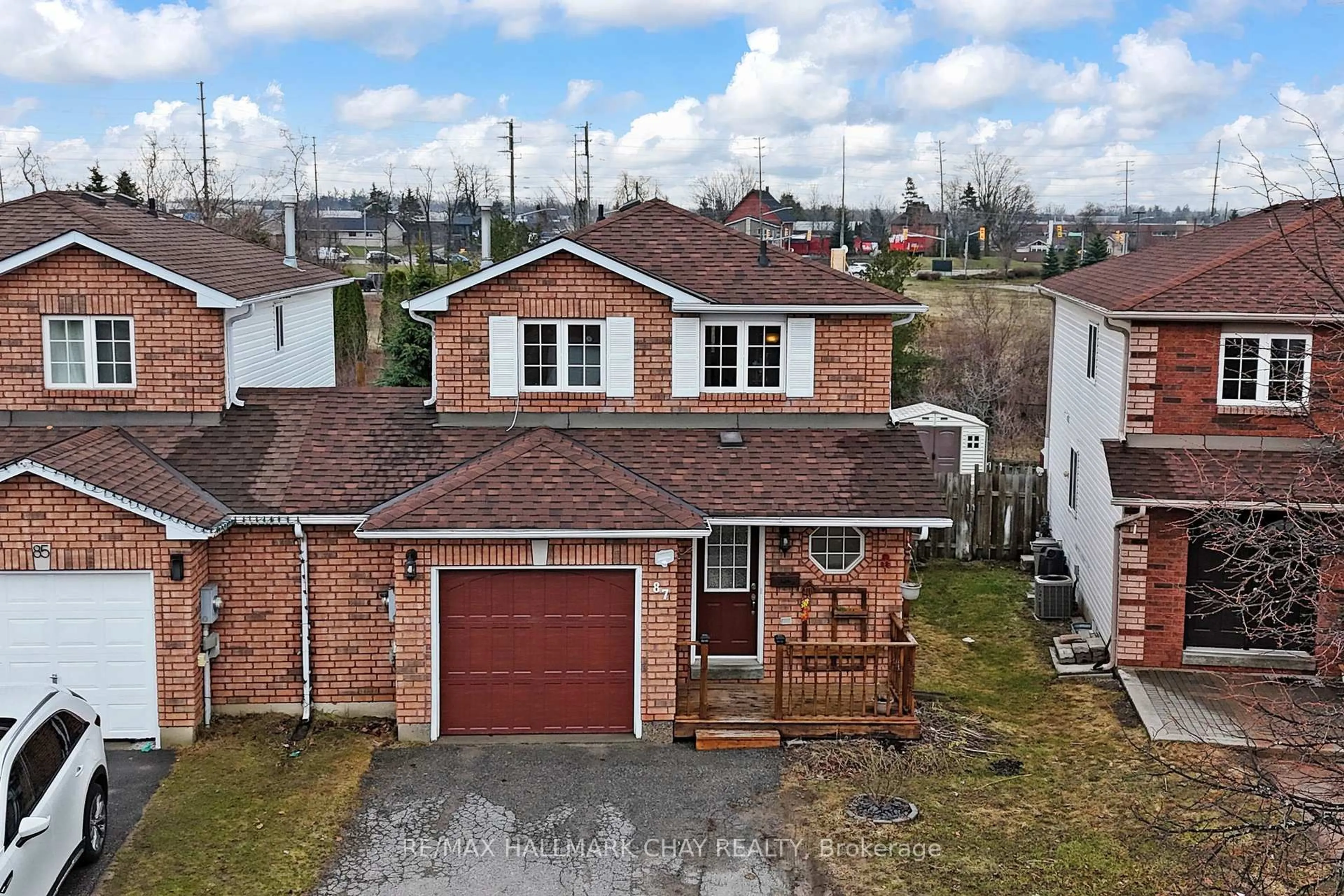 A pic from outside/outdoor area/front of a property/back of a property/a pic from drone, street for 87 Wessenger Dr, Barrie Ontario L4N 8P8