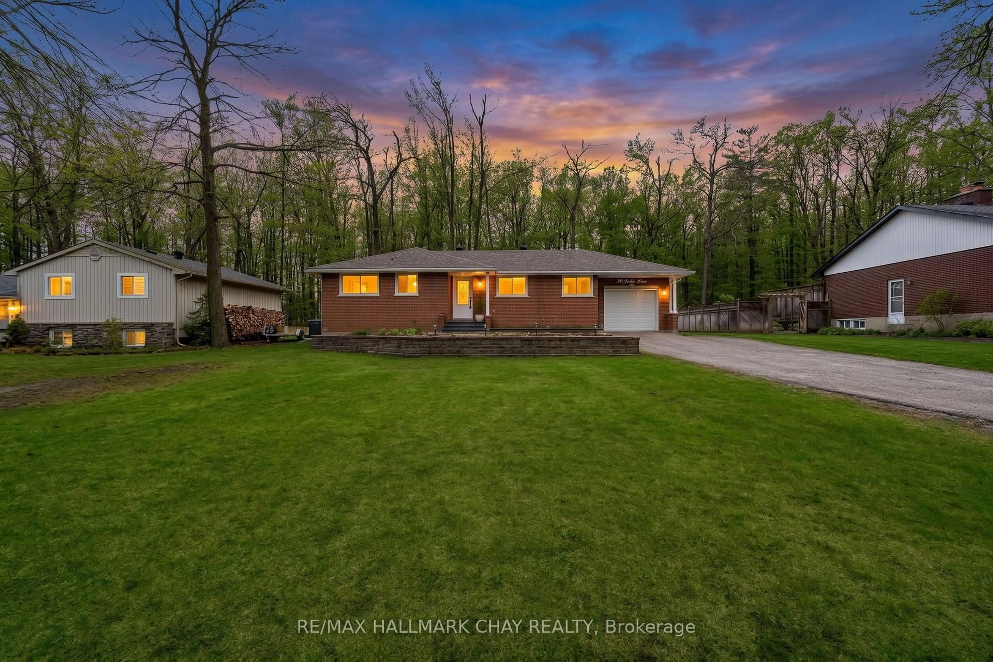 A pic from outside/outdoor area/front of a property/back of a property/a pic from drone, water/lake/river/ocean view for 30 Jodies Lane, Springwater Ontario L0L 1X1