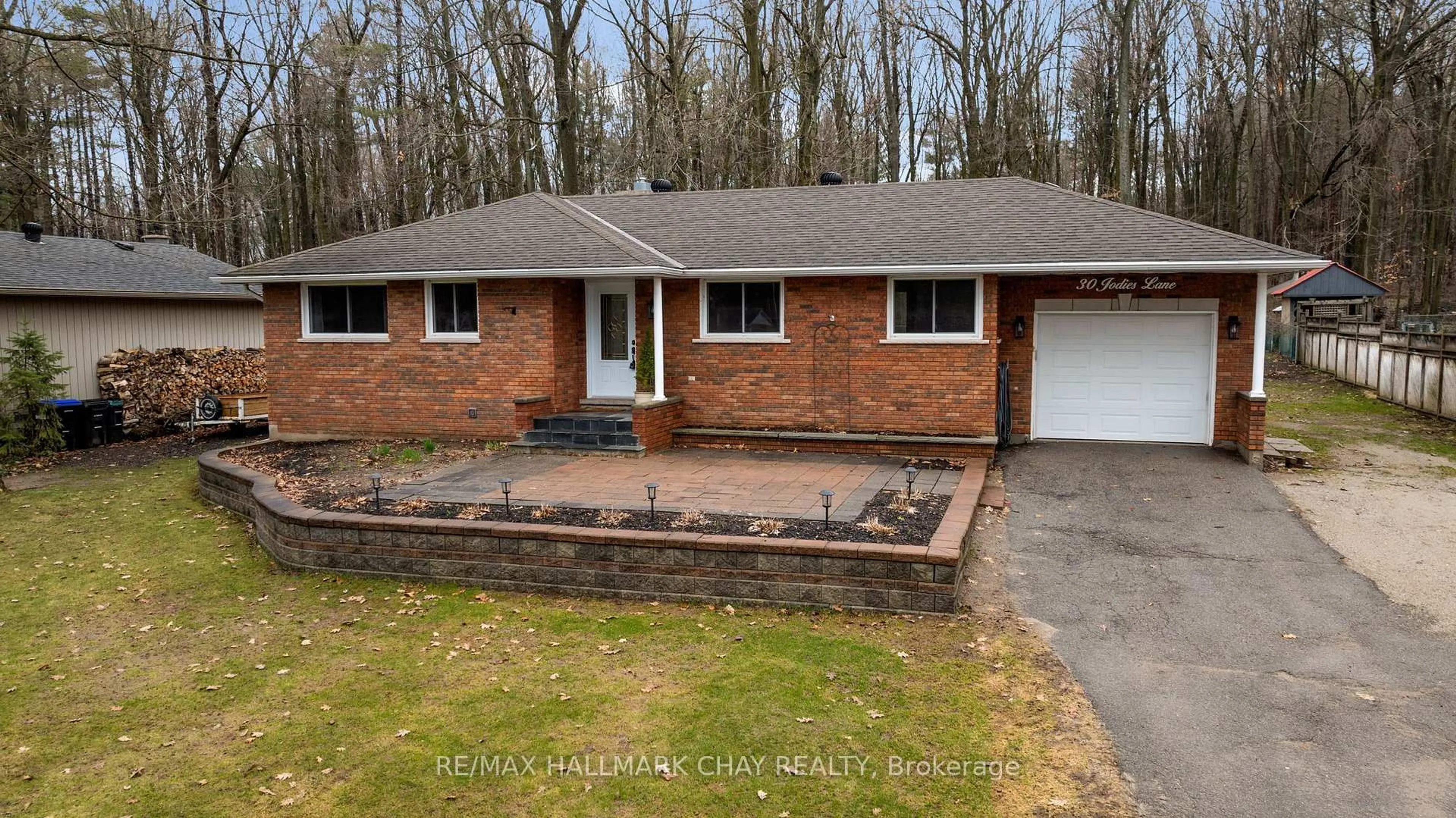 Home with brick exterior material, street for 30 Jodies Lane, Springwater Ontario L0L 1X1