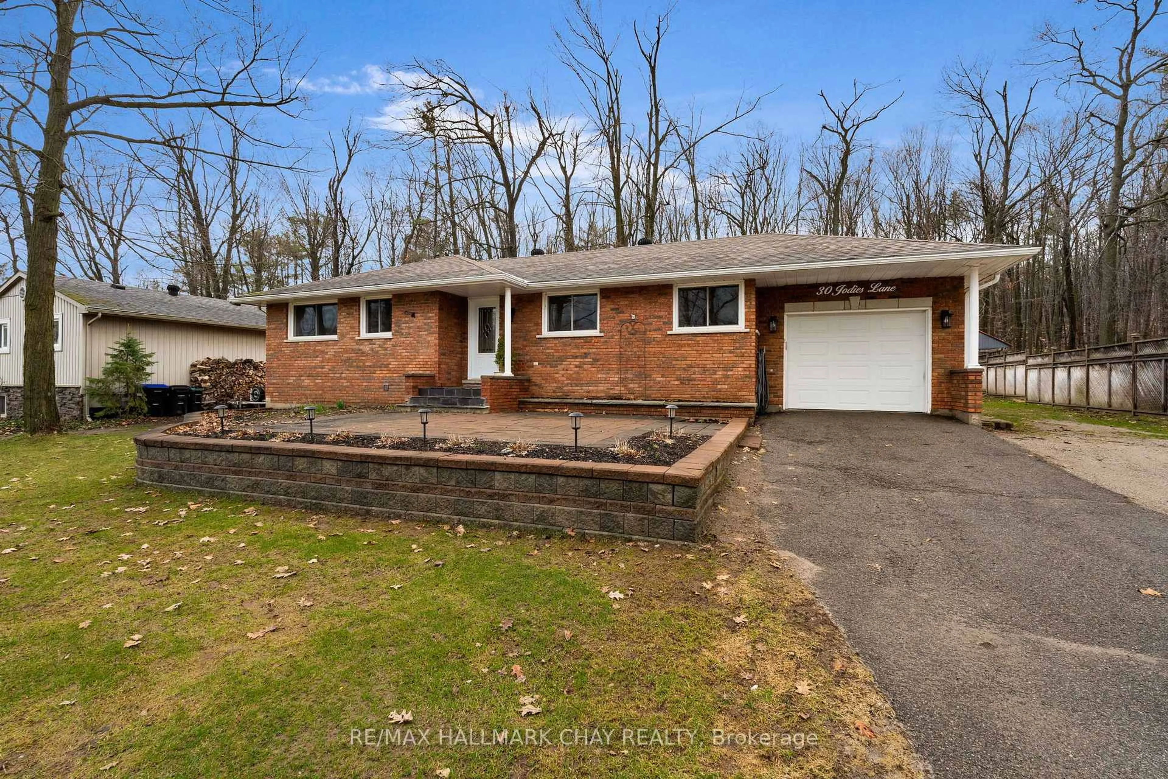 Home with brick exterior material, street for 30 Jodies Lane, Springwater Ontario L0L 1X1