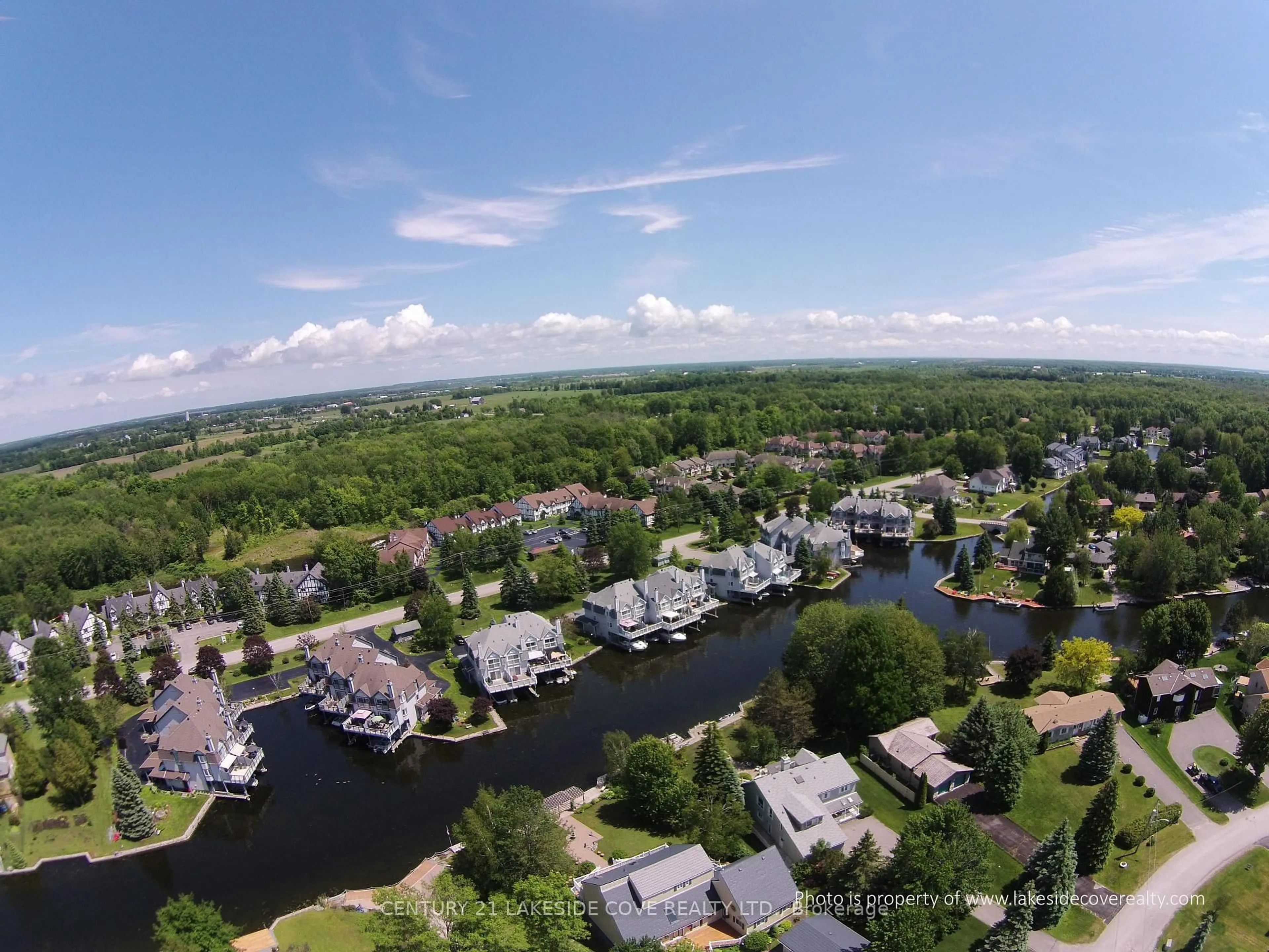 A pic from outside/outdoor area/front of a property/back of a property/a pic from drone, water/lake/river/ocean view for 41 Laguna Pkwy #Unit 8, Ramara Ontario L0K 1B0