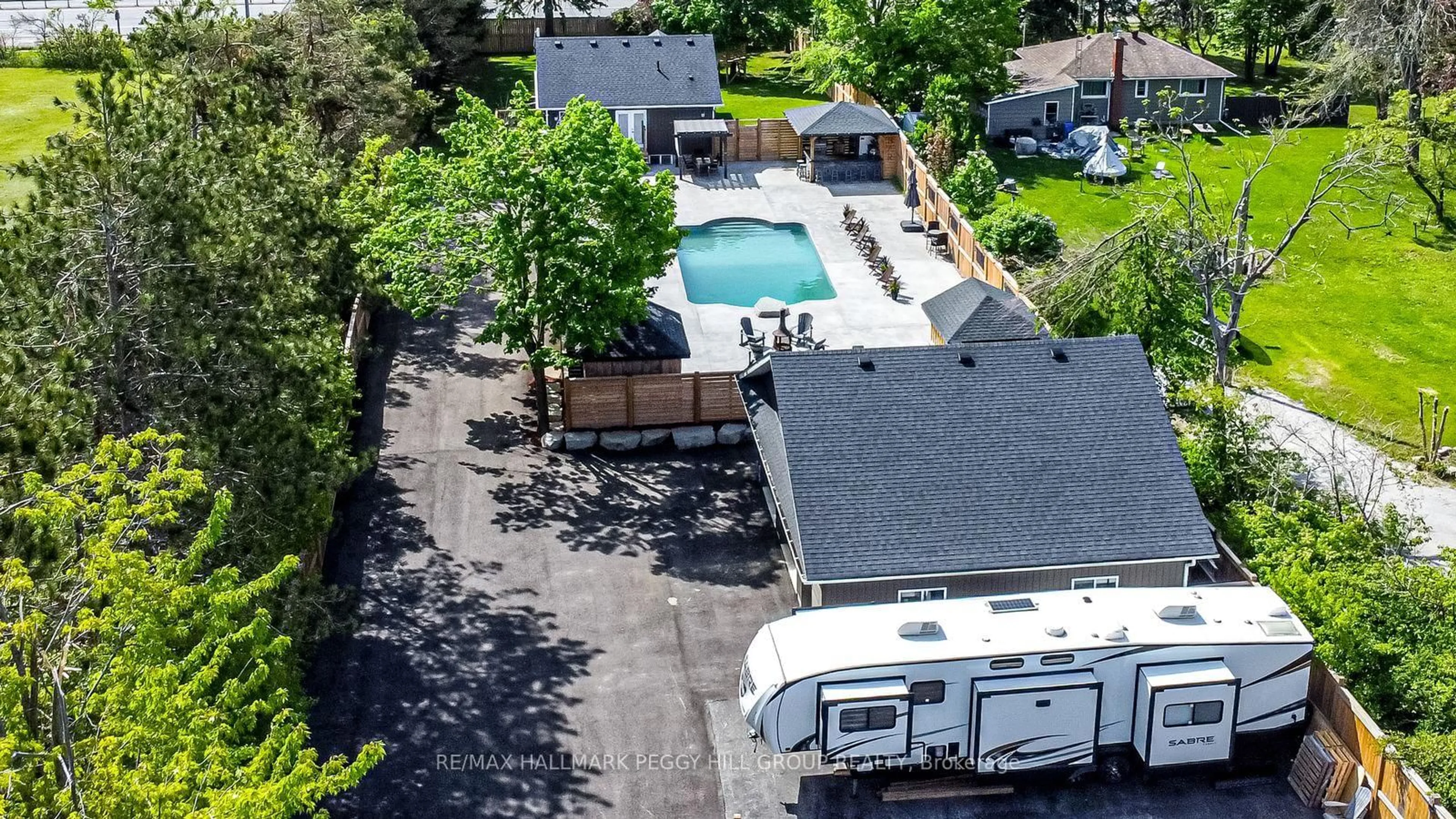 A pic from outside/outdoor area/front of a property/back of a property/a pic from drone, street for 2484 Highway 11, Oro-Medonte Ontario L0L 2E0