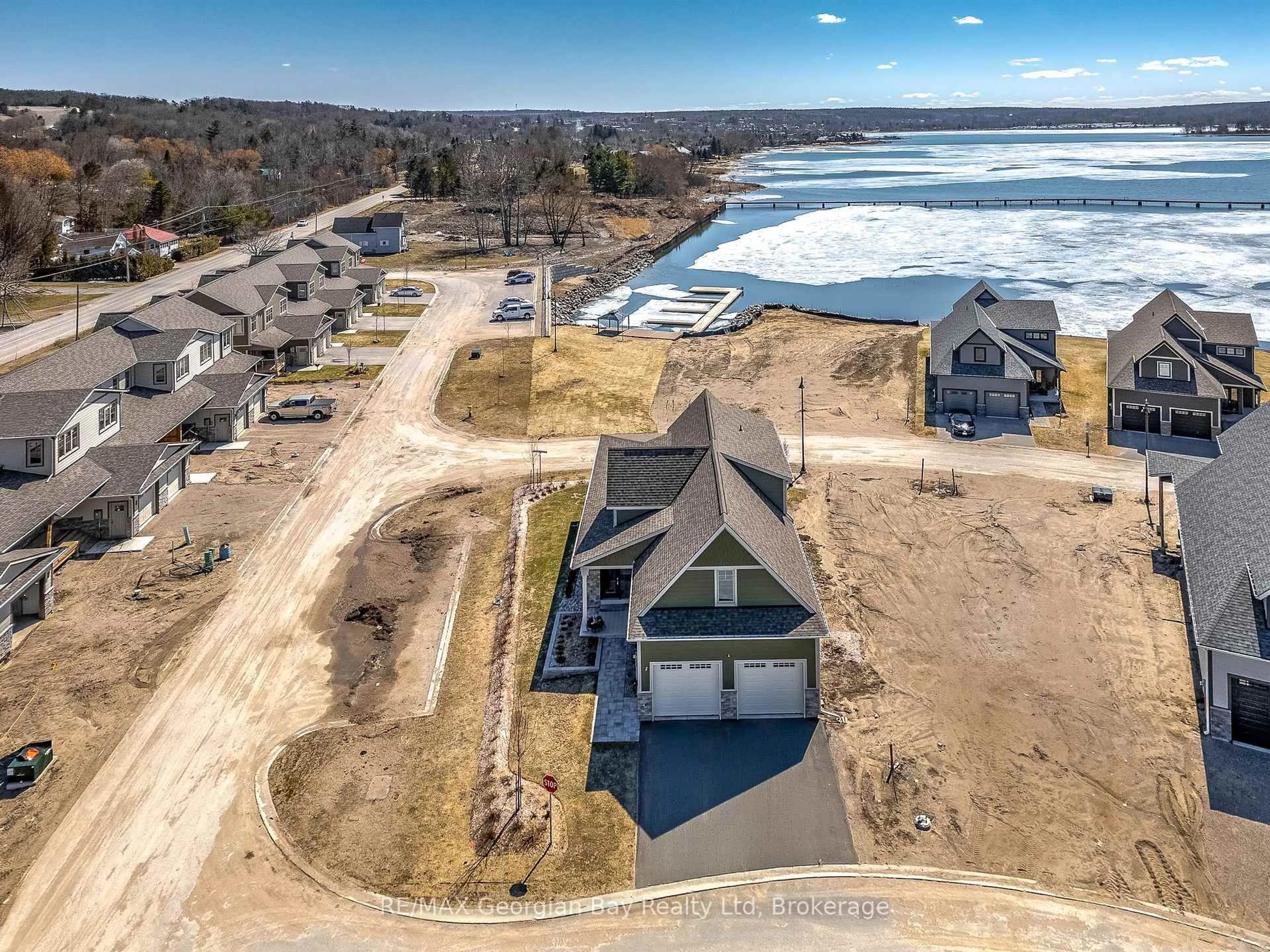 A pic from outside/outdoor area/front of a property/back of a property/a pic from drone, water/lake/river/ocean view for 2 Magazine St, Penetanguishene Ontario L9M 0W6