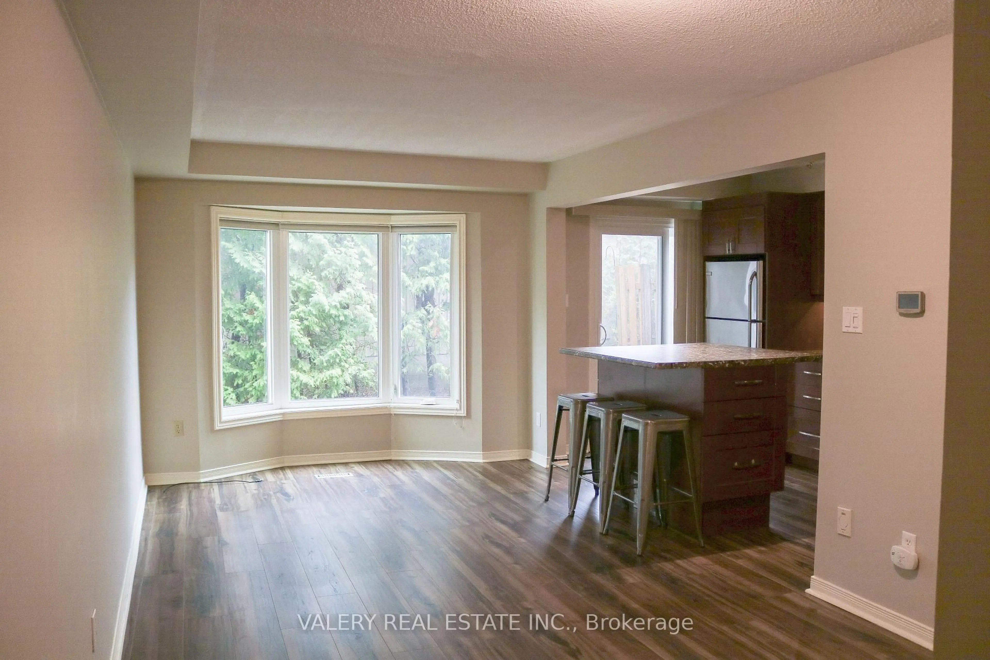 Open concept kitchen, wood/laminate floor for 492 Laclie St #14, Orillia Ontario L3V 7V2