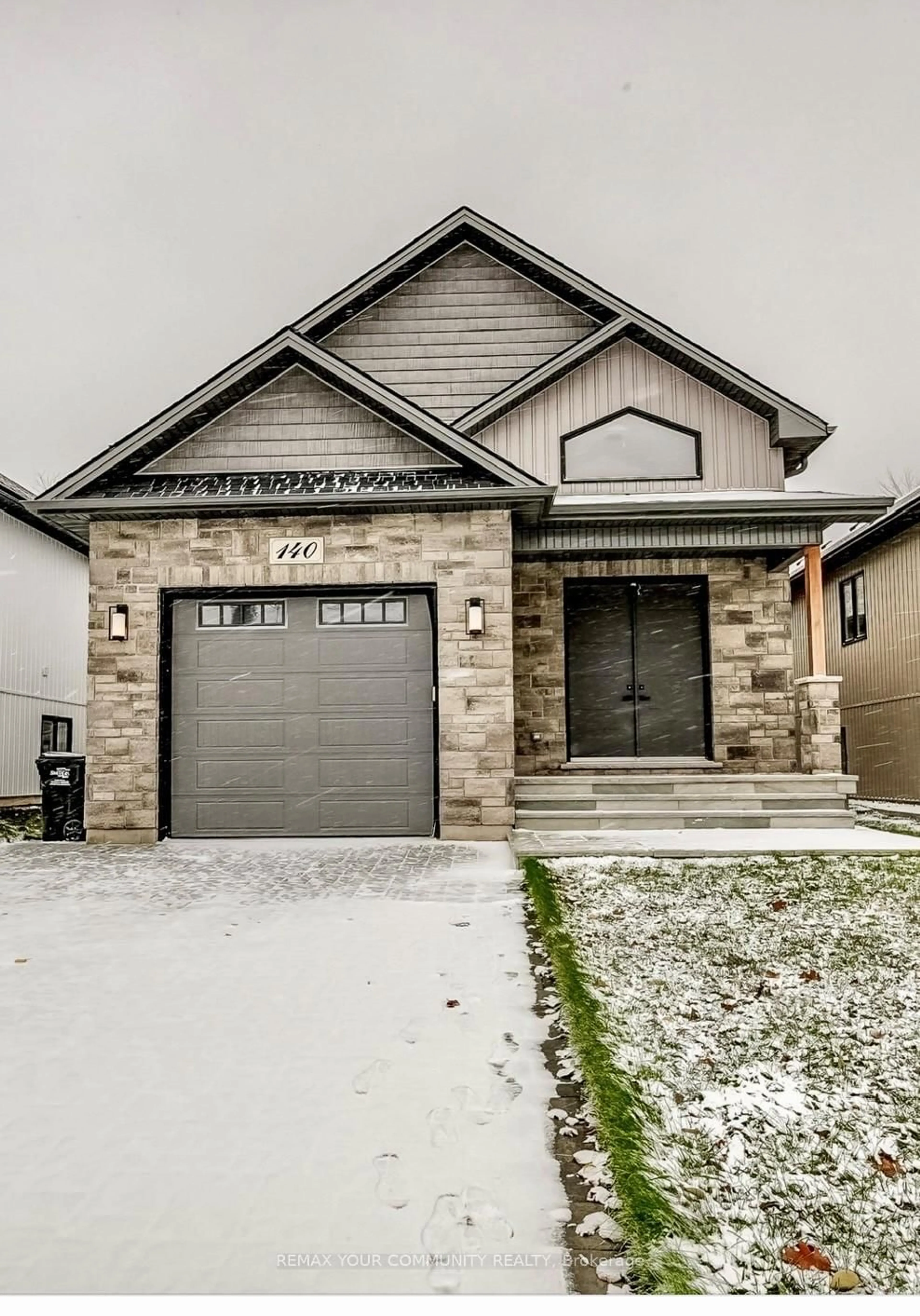 Home with brick exterior material, street for 140 58TH St, Wasaga Beach Ontario L9Z 2Z1