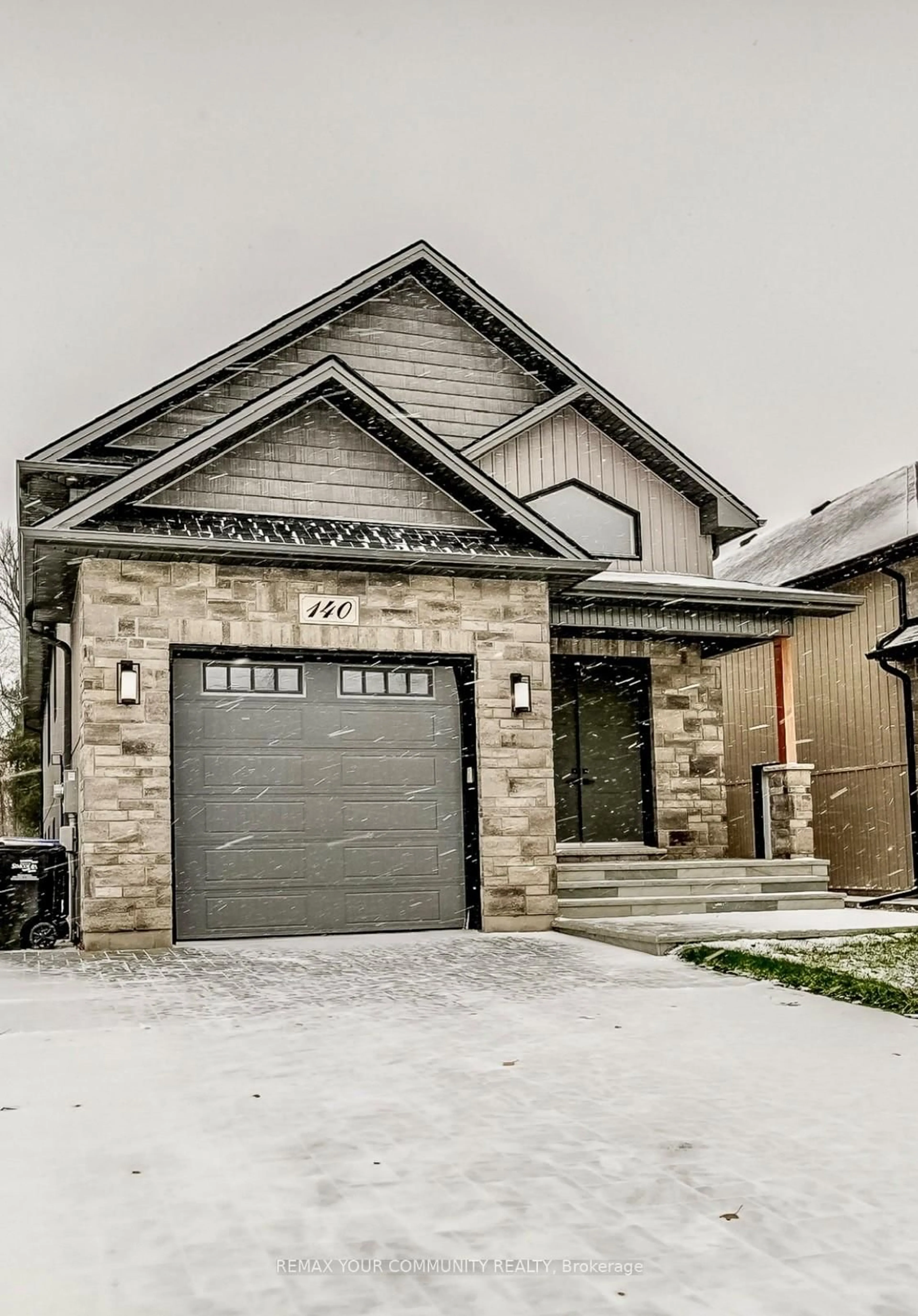 Home with brick exterior material, street for 140 58TH St, Wasaga Beach Ontario L9Z 2Z1