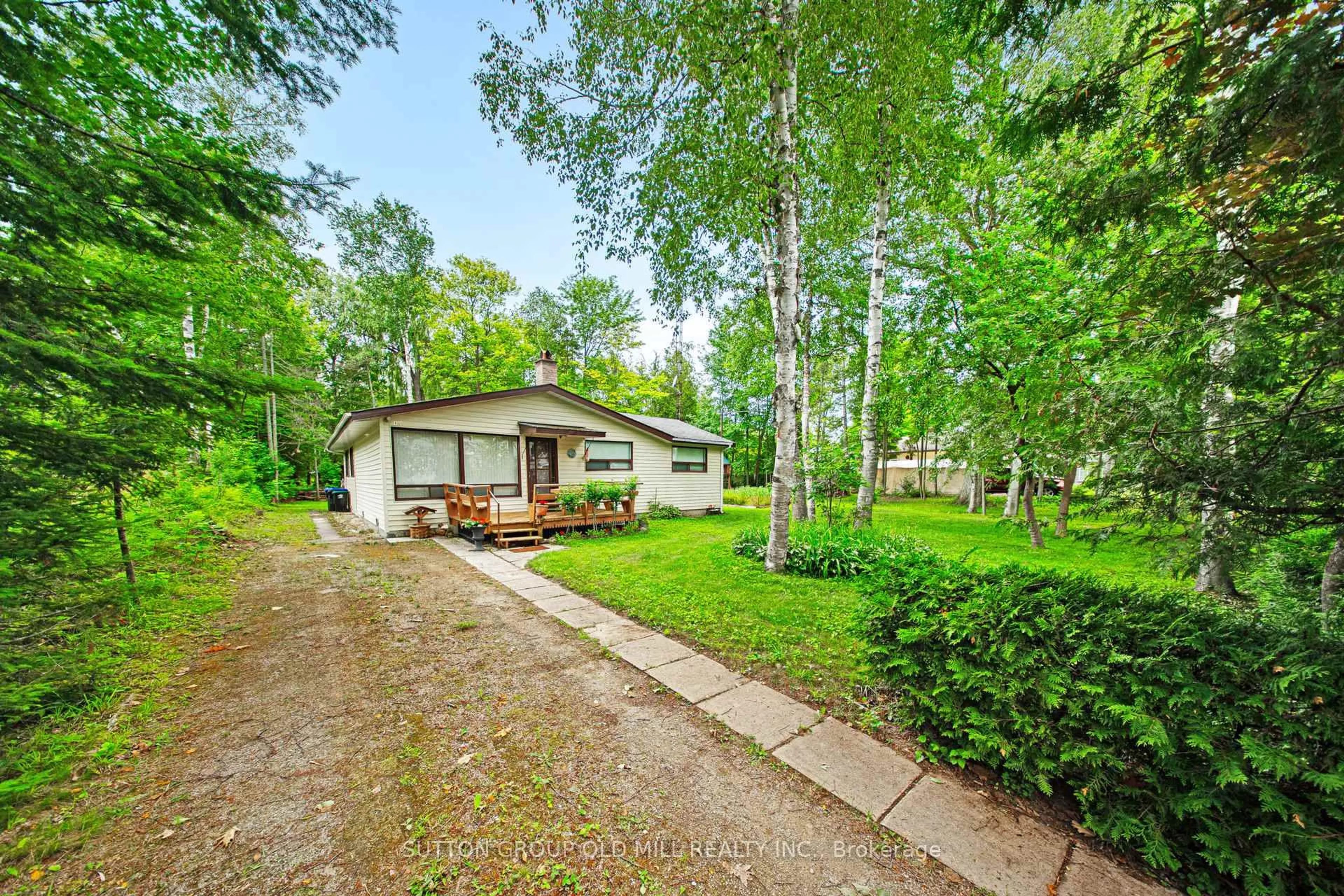 A pic from outside/outdoor area/front of a property/back of a property/a pic from drone, forest/trees view for 42 55th St, Wasaga Beach Ontario L9Z 1W9