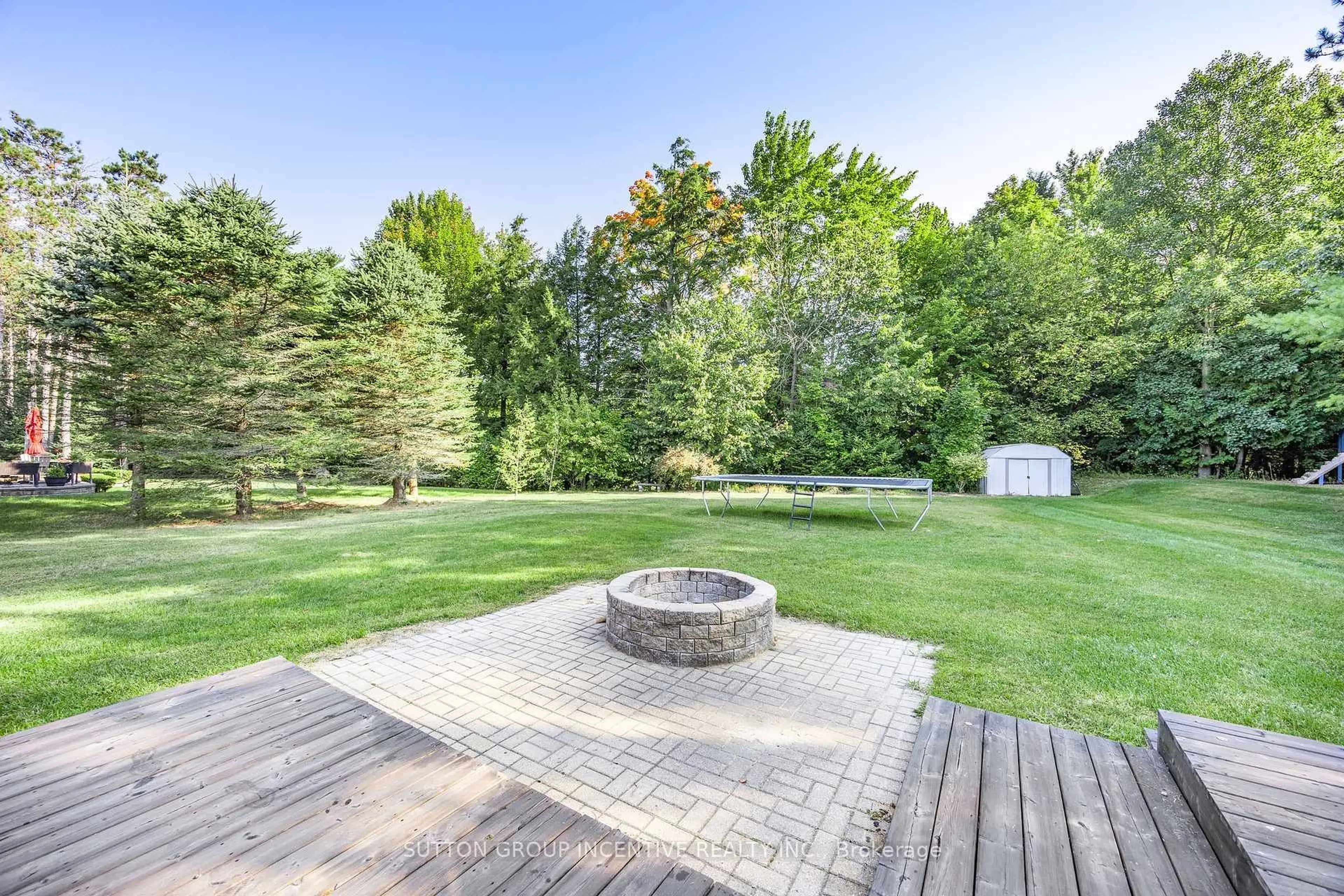 Patio, forest/trees view for 38 Lilac Lane, Springwater Ontario L9S 2B5