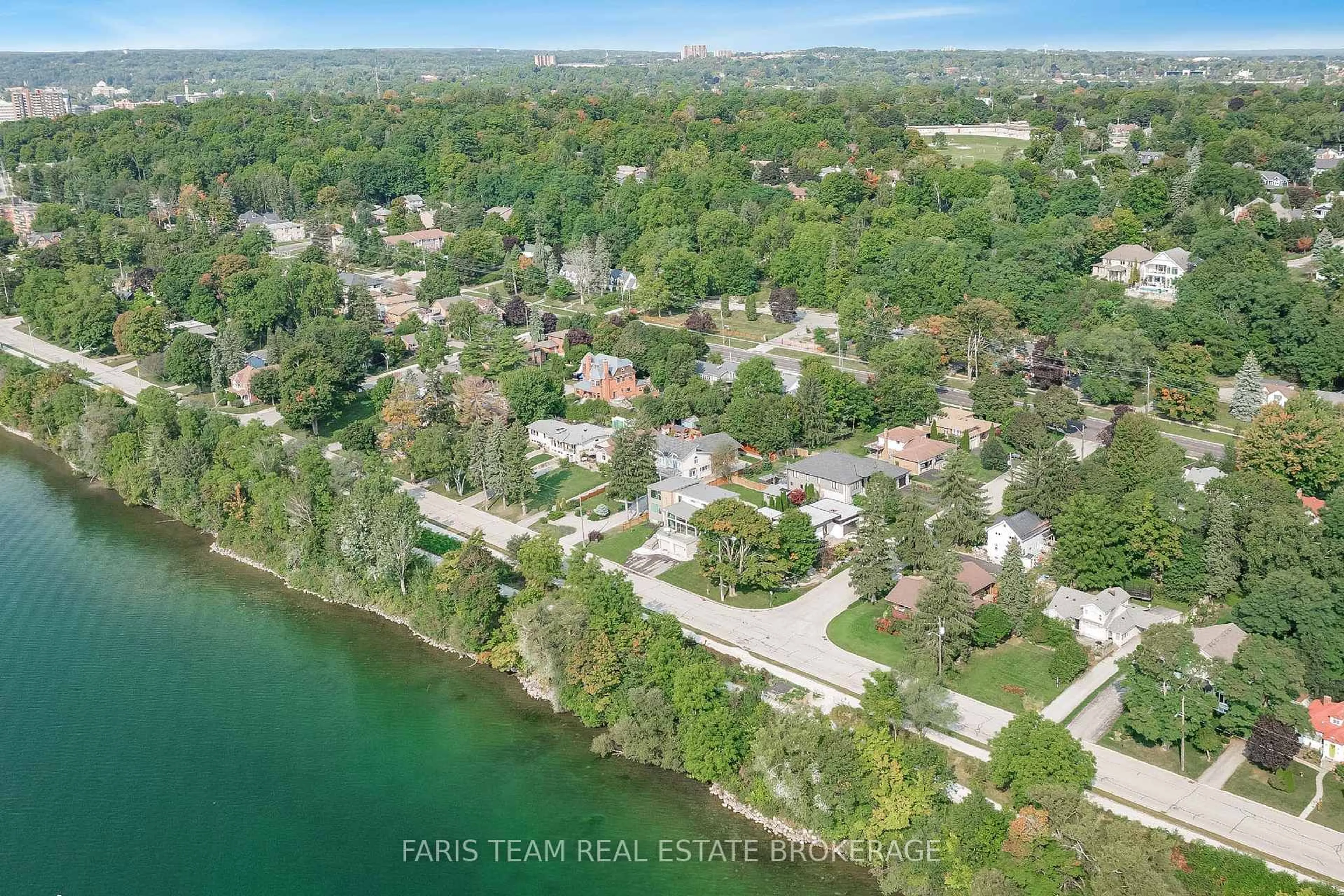 A pic from outside/outdoor area/front of a property/back of a property/a pic from drone, water/lake/river/ocean view for 202 Kempenfelt Dr, Barrie Ontario L4M 1C3