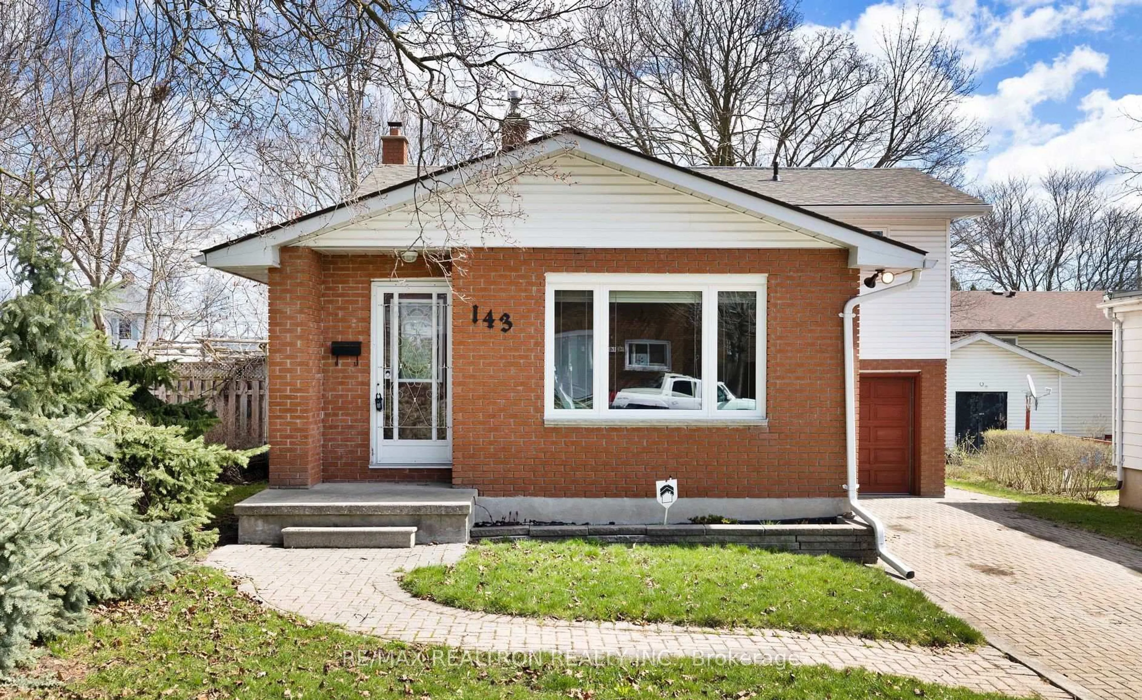 Home with brick exterior material, street for 143 Peel St, Barrie Ontario L4M 3L7