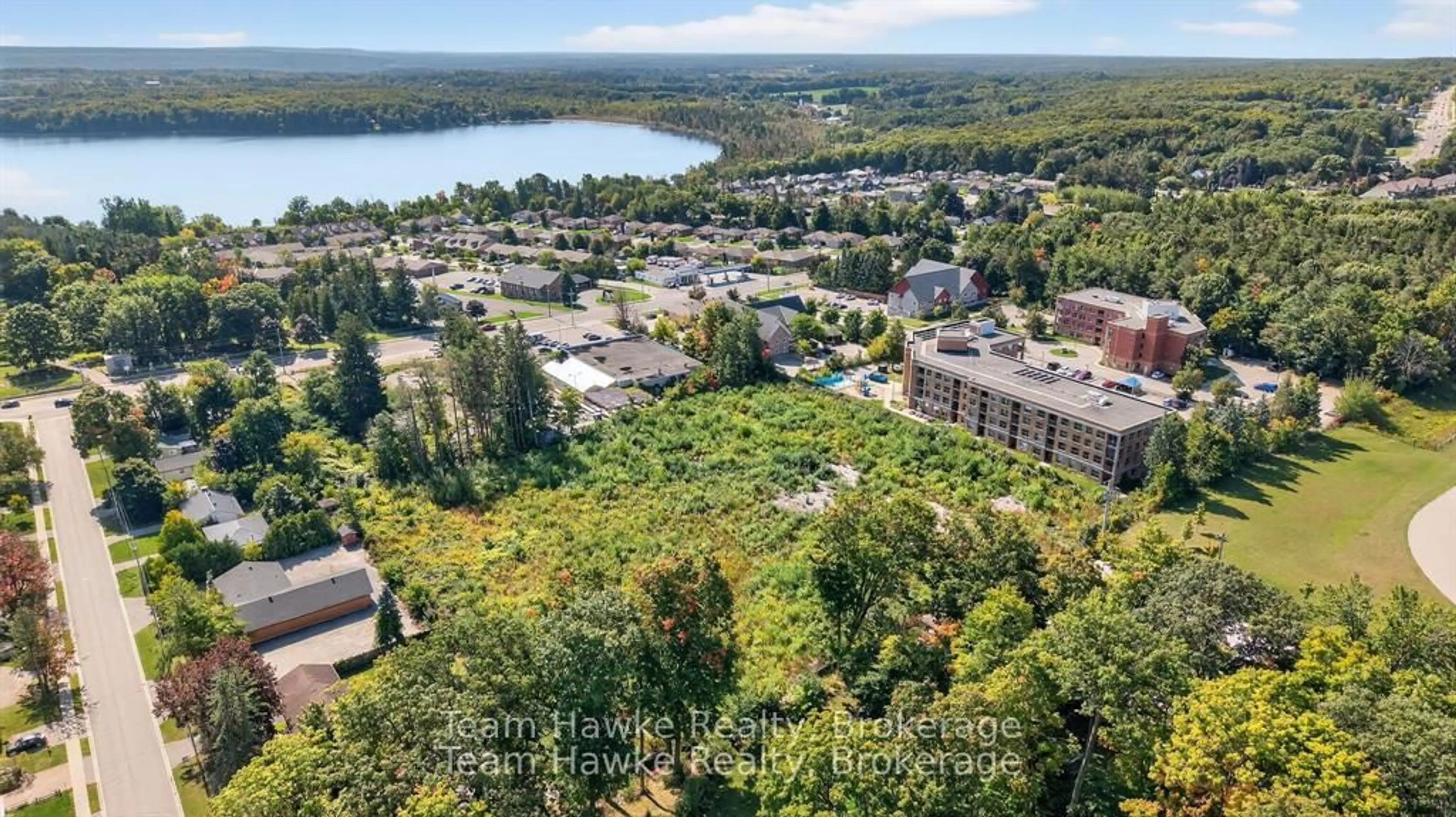 A pic from outside/outdoor area/front of a property/back of a property/a pic from drone, water/lake/river/ocean view for 319 Gervais St #2A, Midland Ontario L4R 4C6