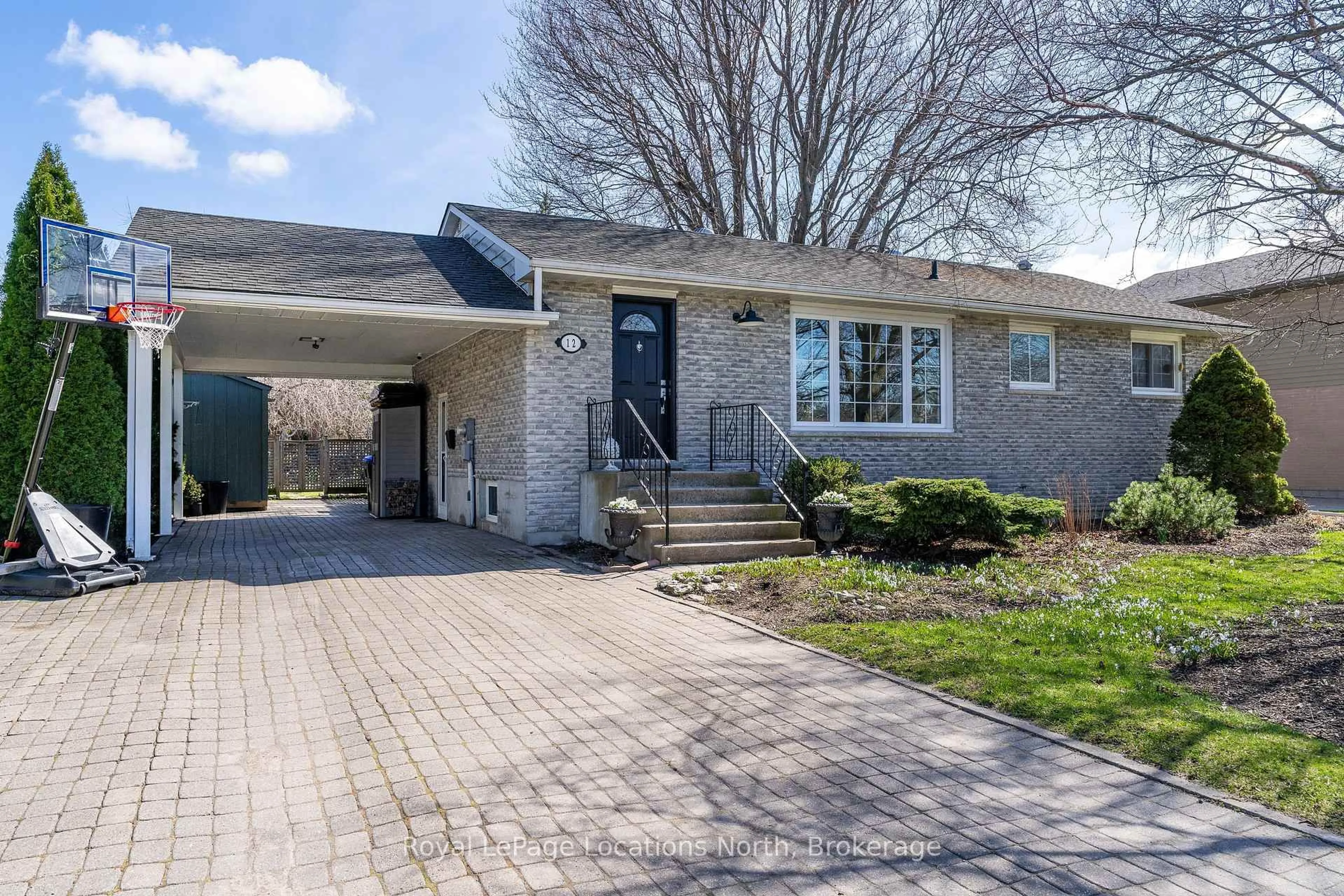 Home with brick exterior material, street for 12 Bryan Dr, Collingwood Ontario L9Y 2K7