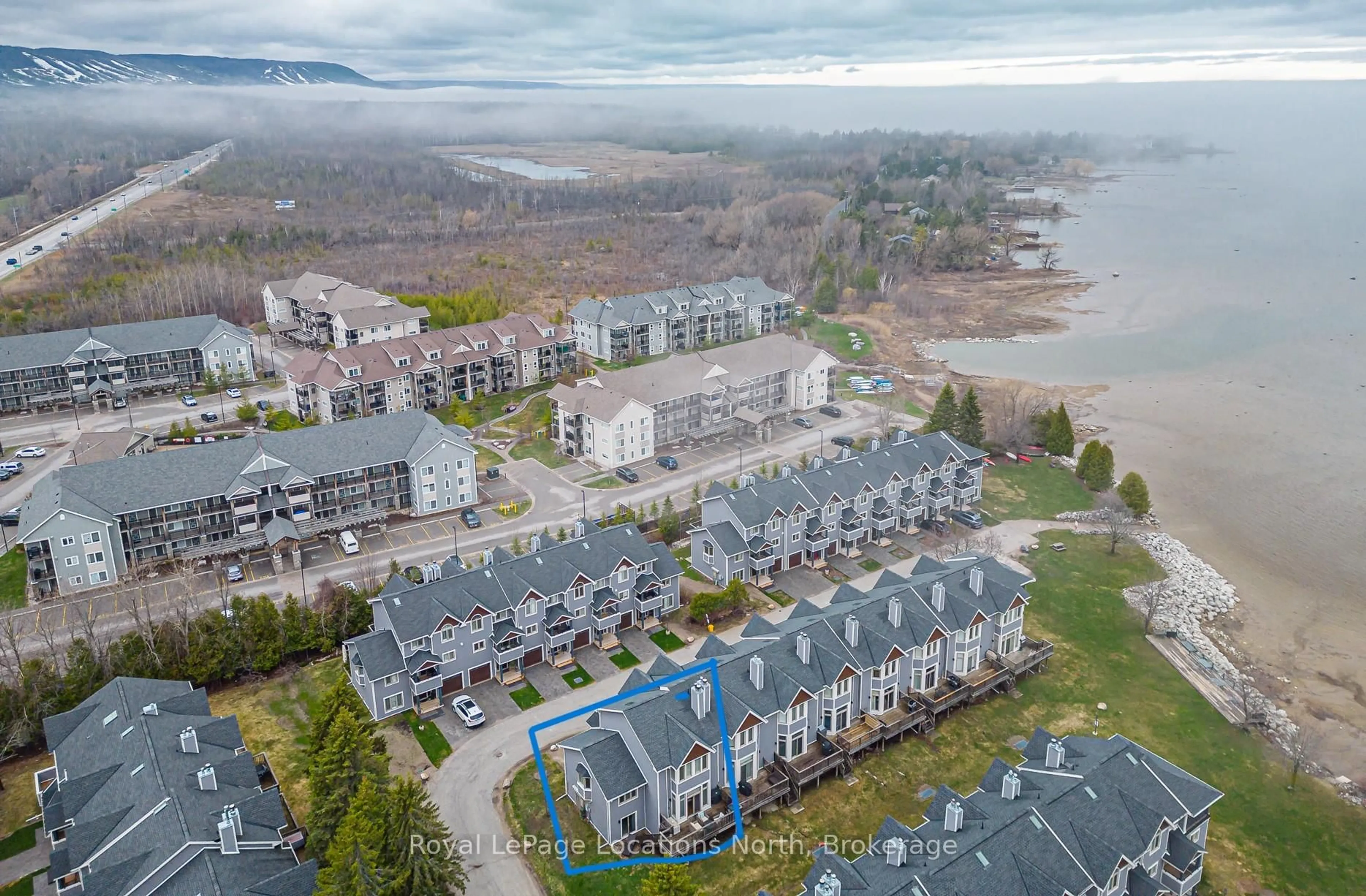 A pic from outside/outdoor area/front of a property/back of a property/a pic from drone, water/lake/river/ocean view for 51 Lighthouse Lane, Collingwood Ontario L9Y 5C8