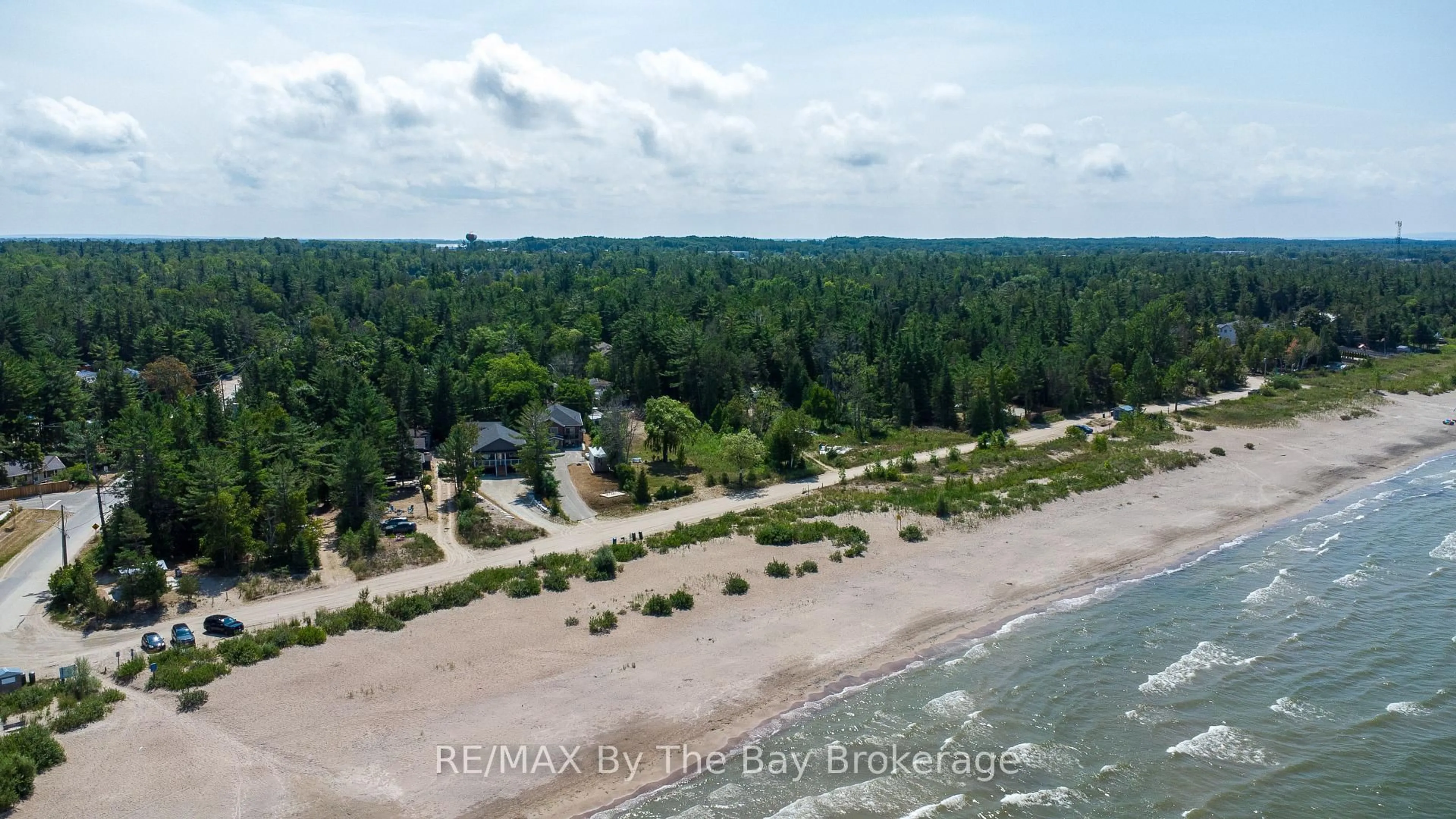 A pic from outside/outdoor area/front of a property/back of a property/a pic from drone, water/lake/river/ocean view for 54 Homewood Ave, Wasaga Beach Ontario L9Z 2M2