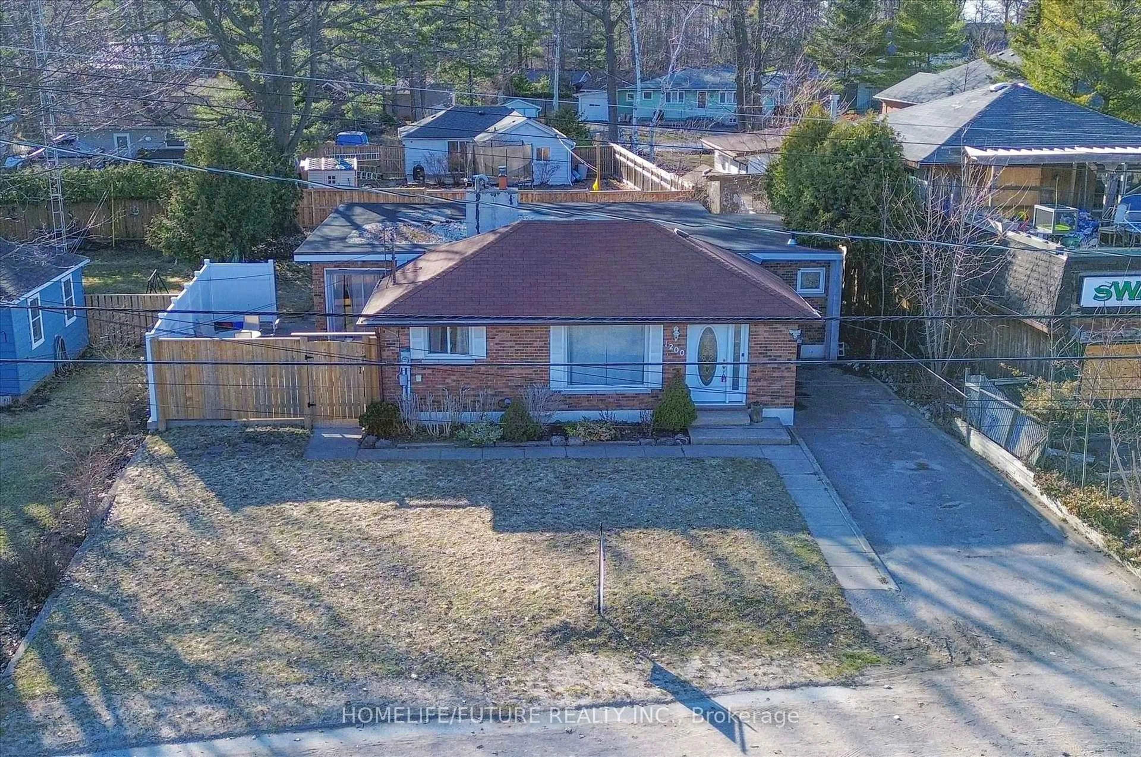 A pic from outside/outdoor area/front of a property/back of a property/a pic from drone, street for 1200 Mosley St, Wasaga Beach Ontario L9Z 2E7