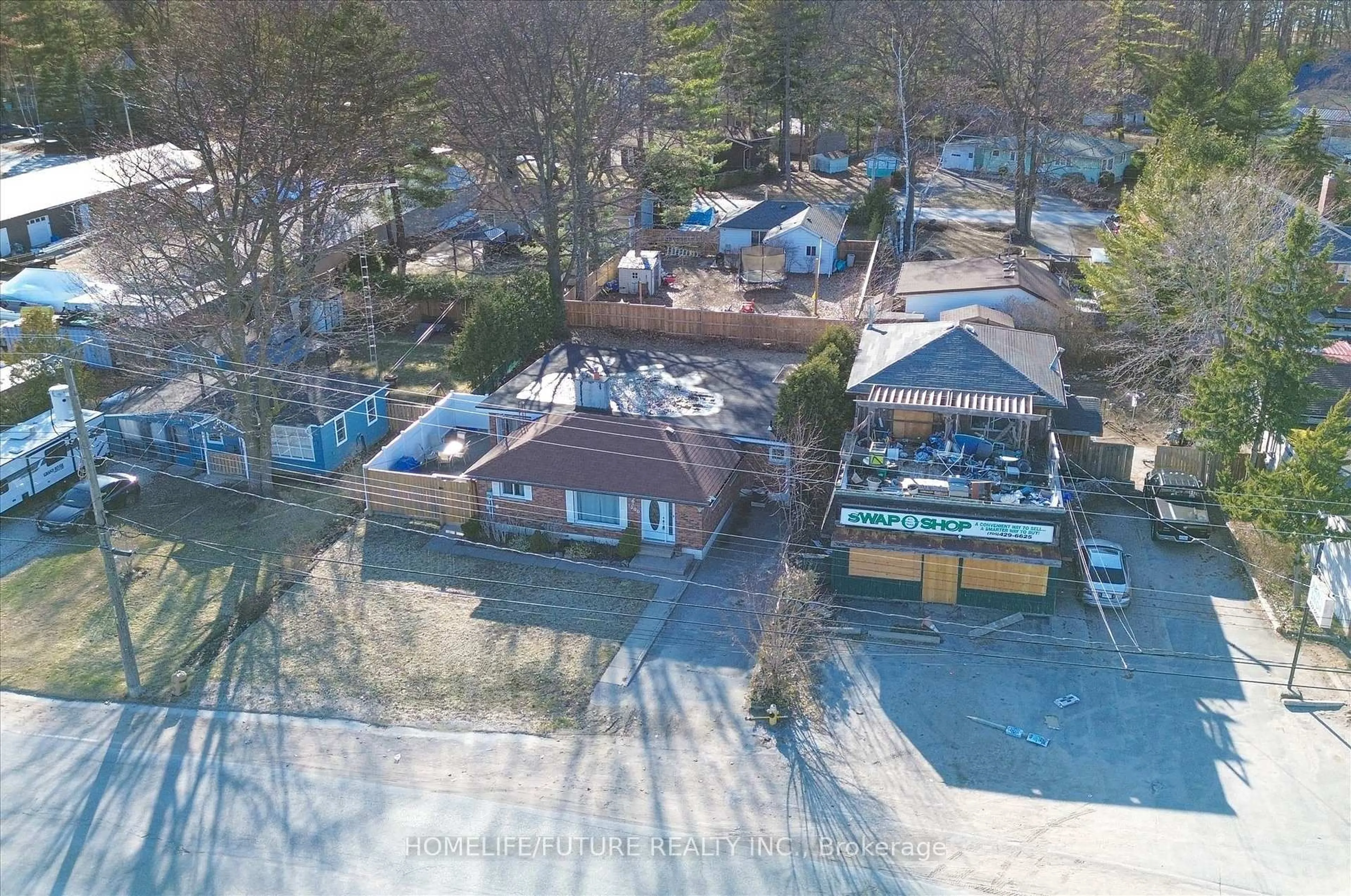 A pic from outside/outdoor area/front of a property/back of a property/a pic from drone, street for 1200 Mosley St, Wasaga Beach Ontario L9Z 2E7