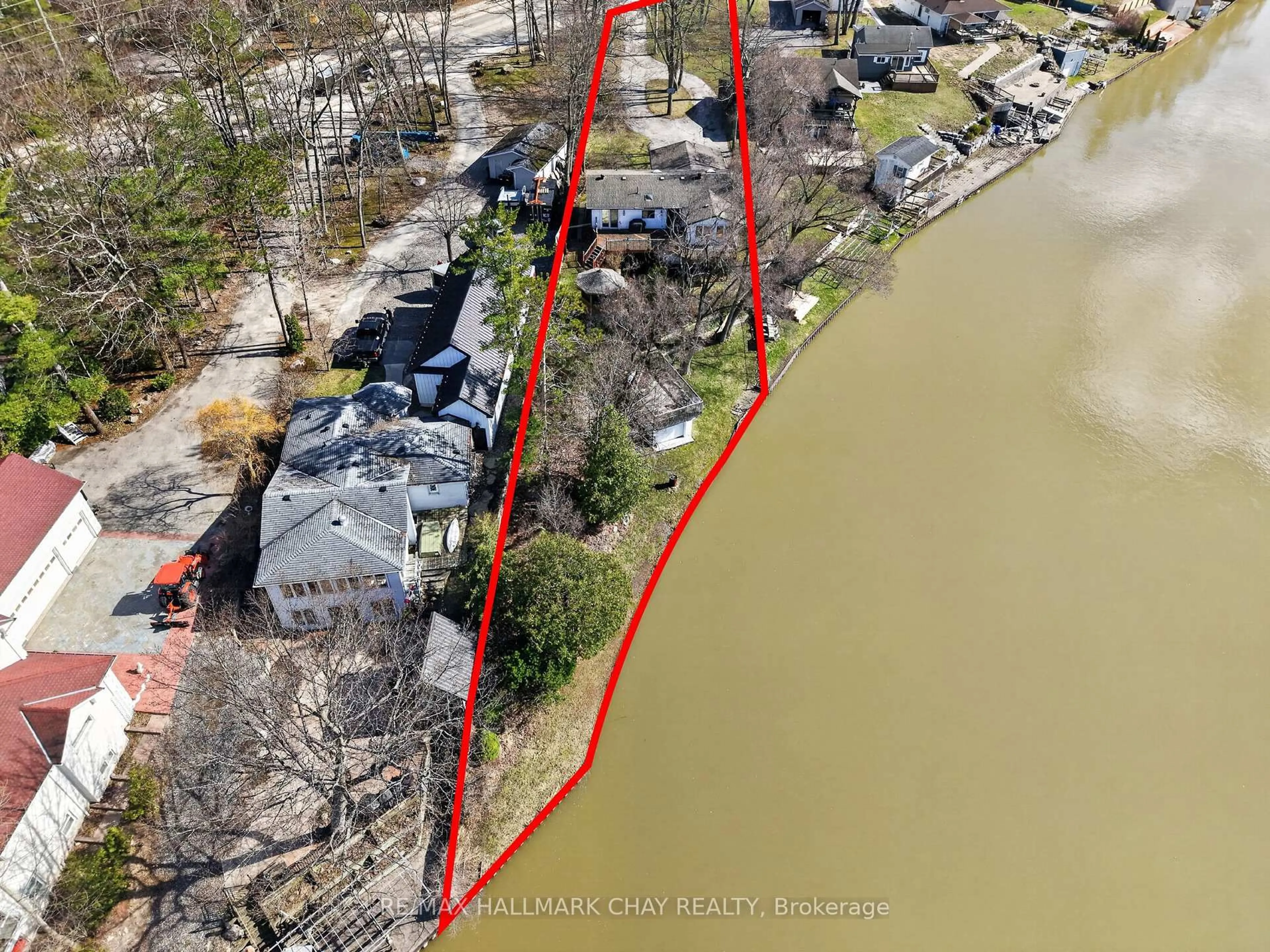 A pic from outside/outdoor area/front of a property/back of a property/a pic from drone, water/lake/river/ocean view for 1976 River Rd, Wasaga Beach Ontario L9Z 2W2