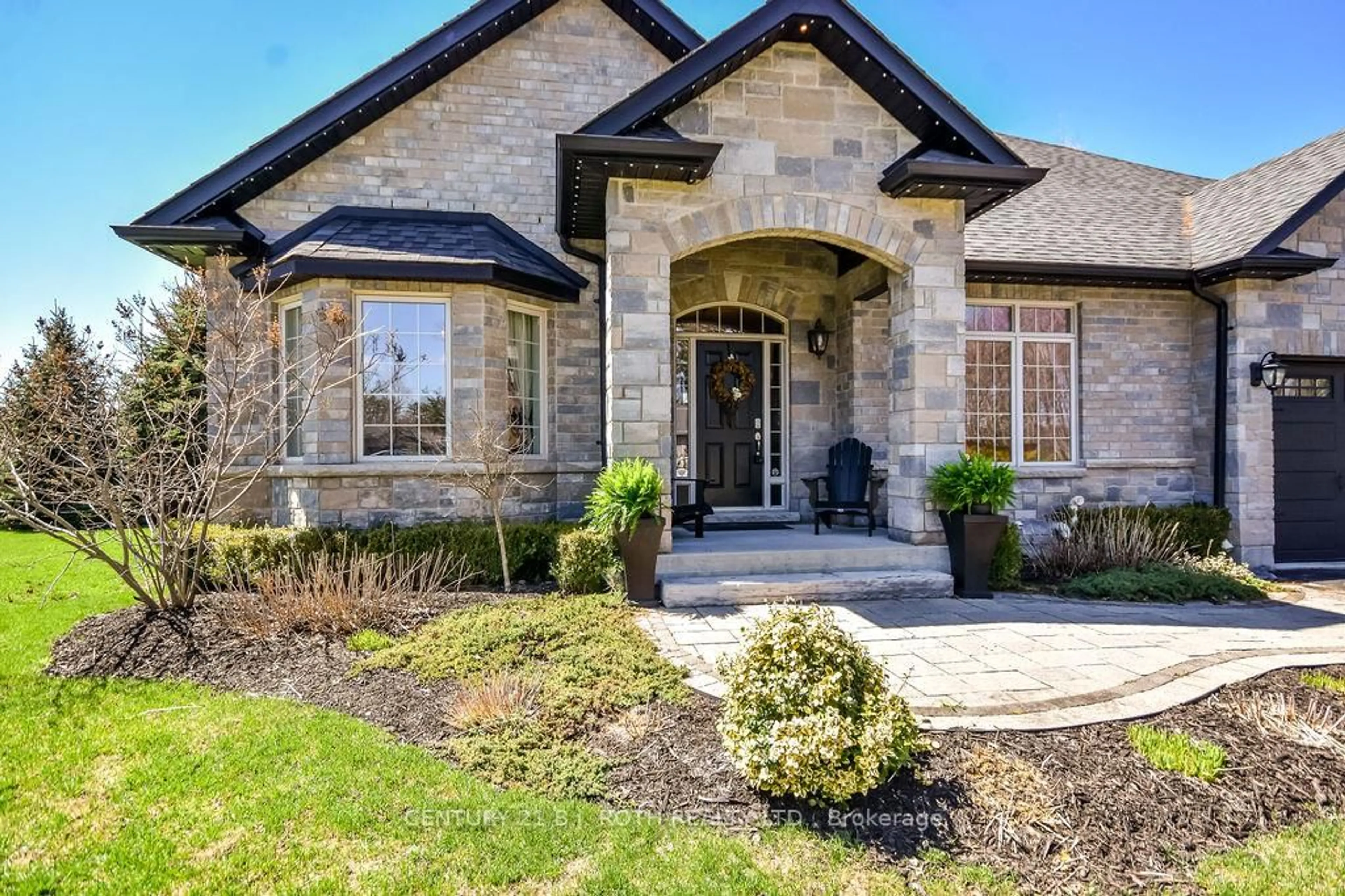 Home with brick exterior material, street for 2 Roy Hickling Dr, Springwater Ontario L9X 0J2