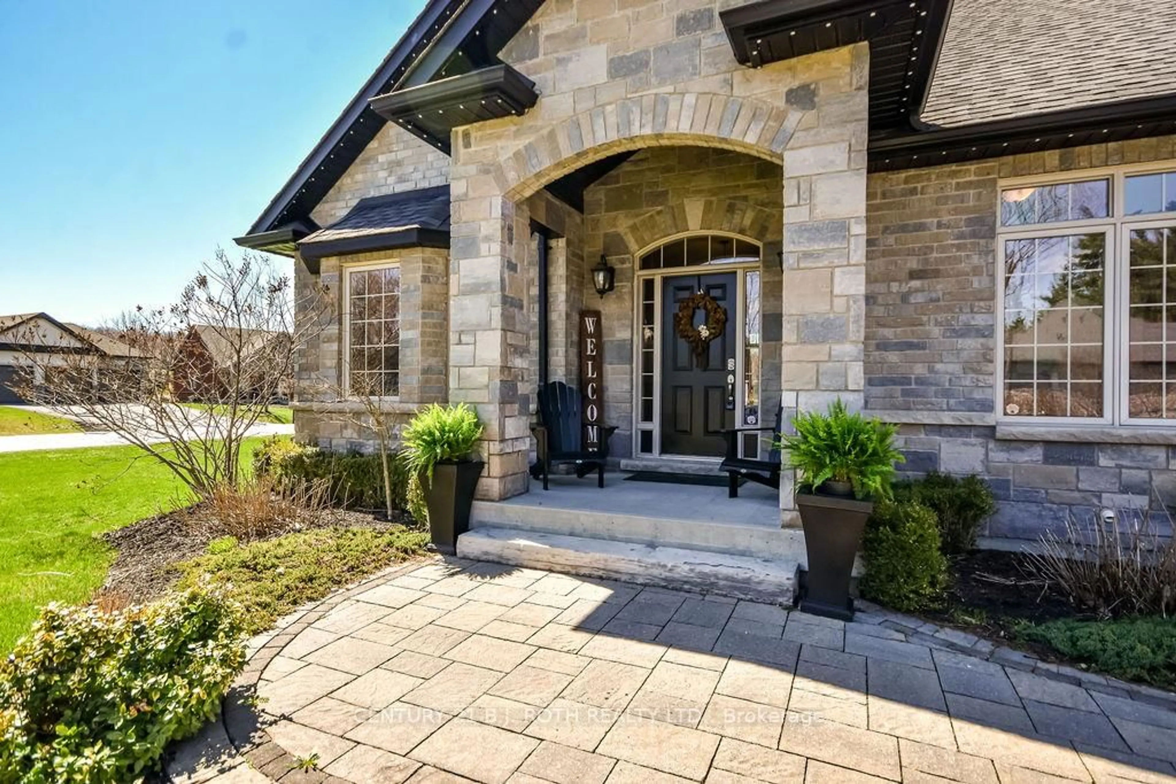 Home with brick exterior material, street for 2 Roy Hickling Dr, Springwater Ontario L9X 0J2