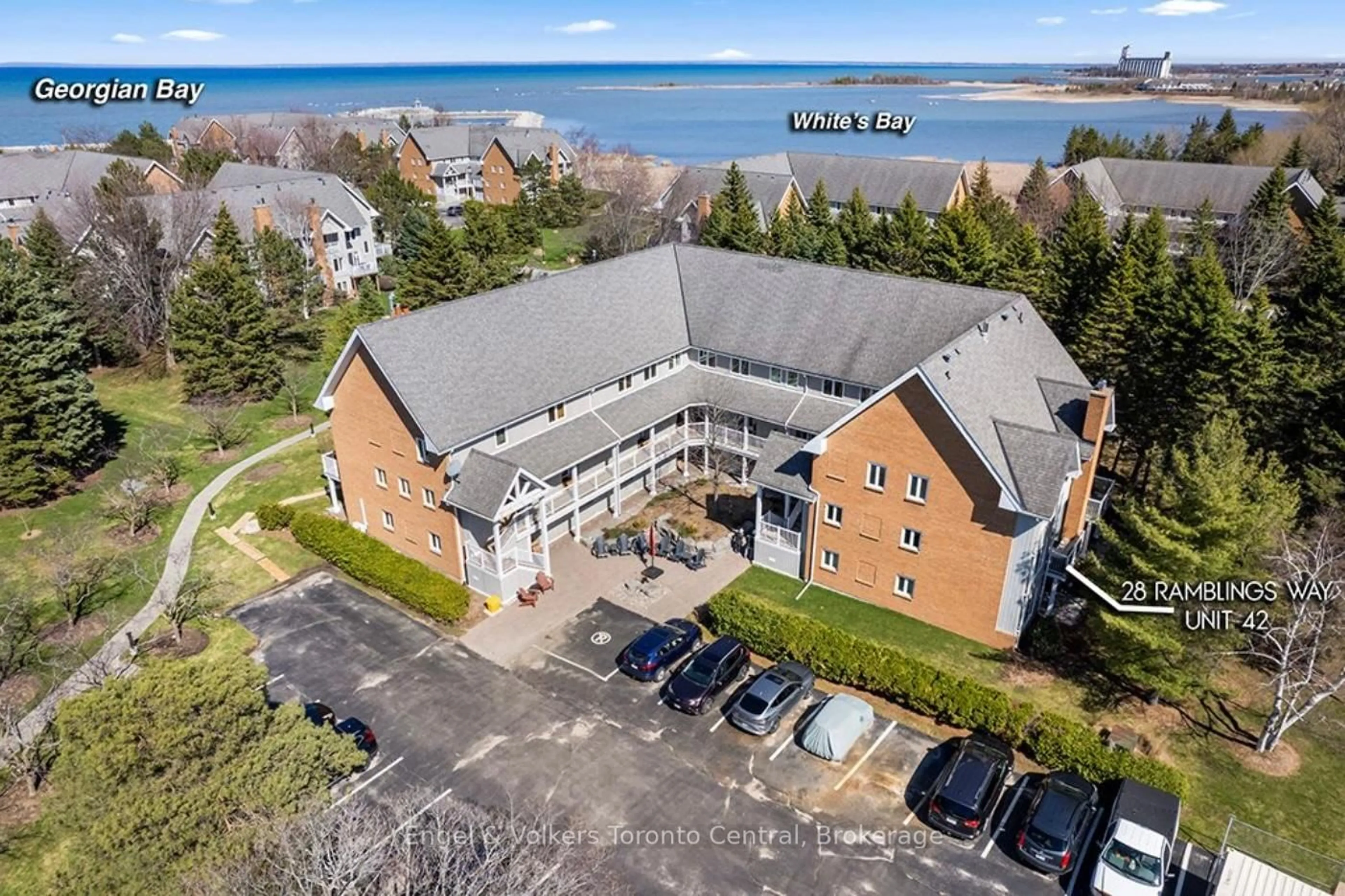 A pic from outside/outdoor area/front of a property/back of a property/a pic from drone, water/lake/river/ocean view for 28 Ramblings Way #42, Collingwood Ontario L9Y 5C6