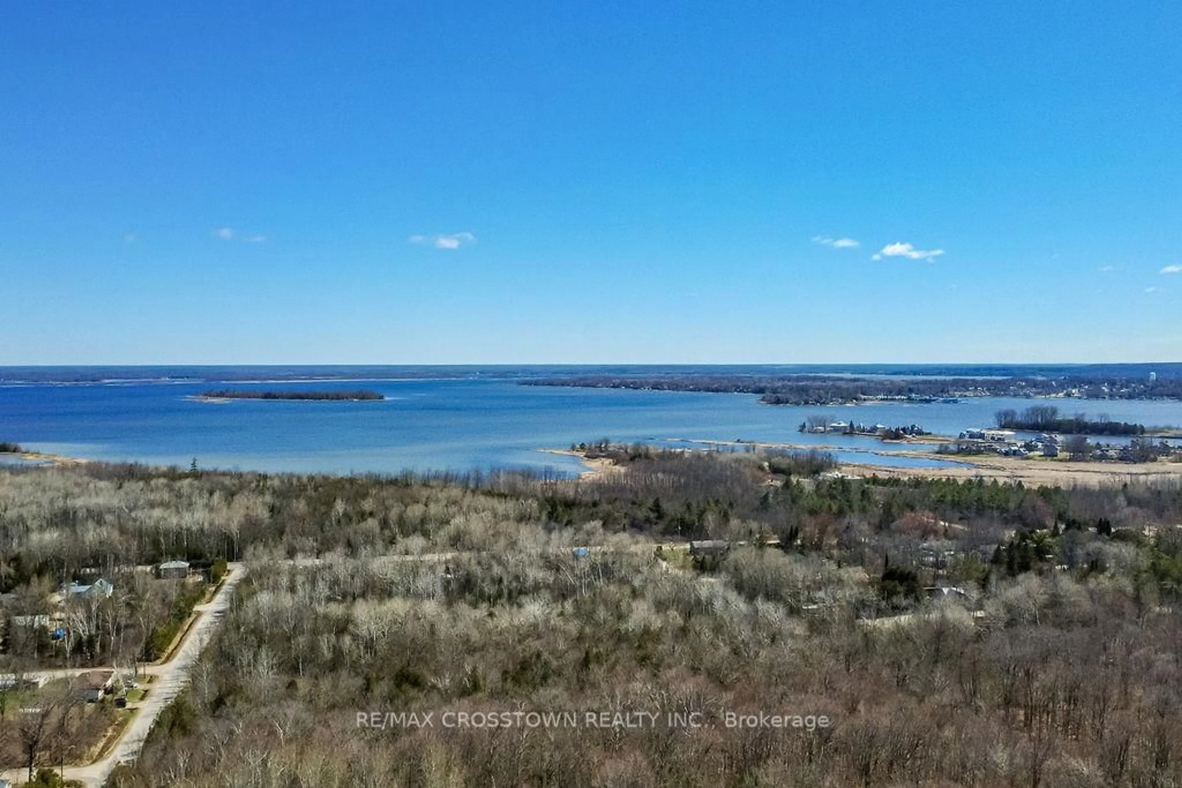 A pic from outside/outdoor area/front of a property/back of a property/a pic from drone, water/lake/river/ocean view for 461 Barnes Ave, Tay Ontario L0K 1R0
