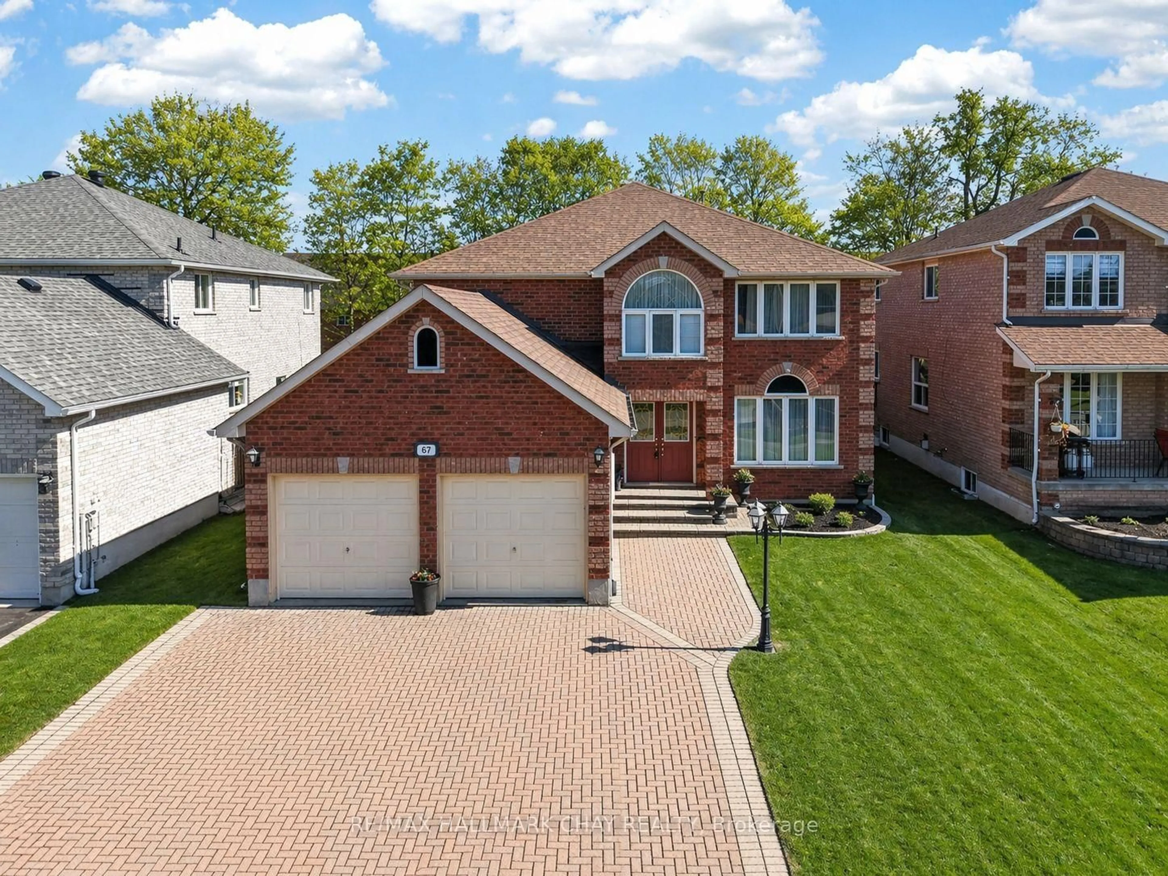 Home with brick exterior material, street for 67 Livia Herman Way, Barrie Ontario L4M 6X2