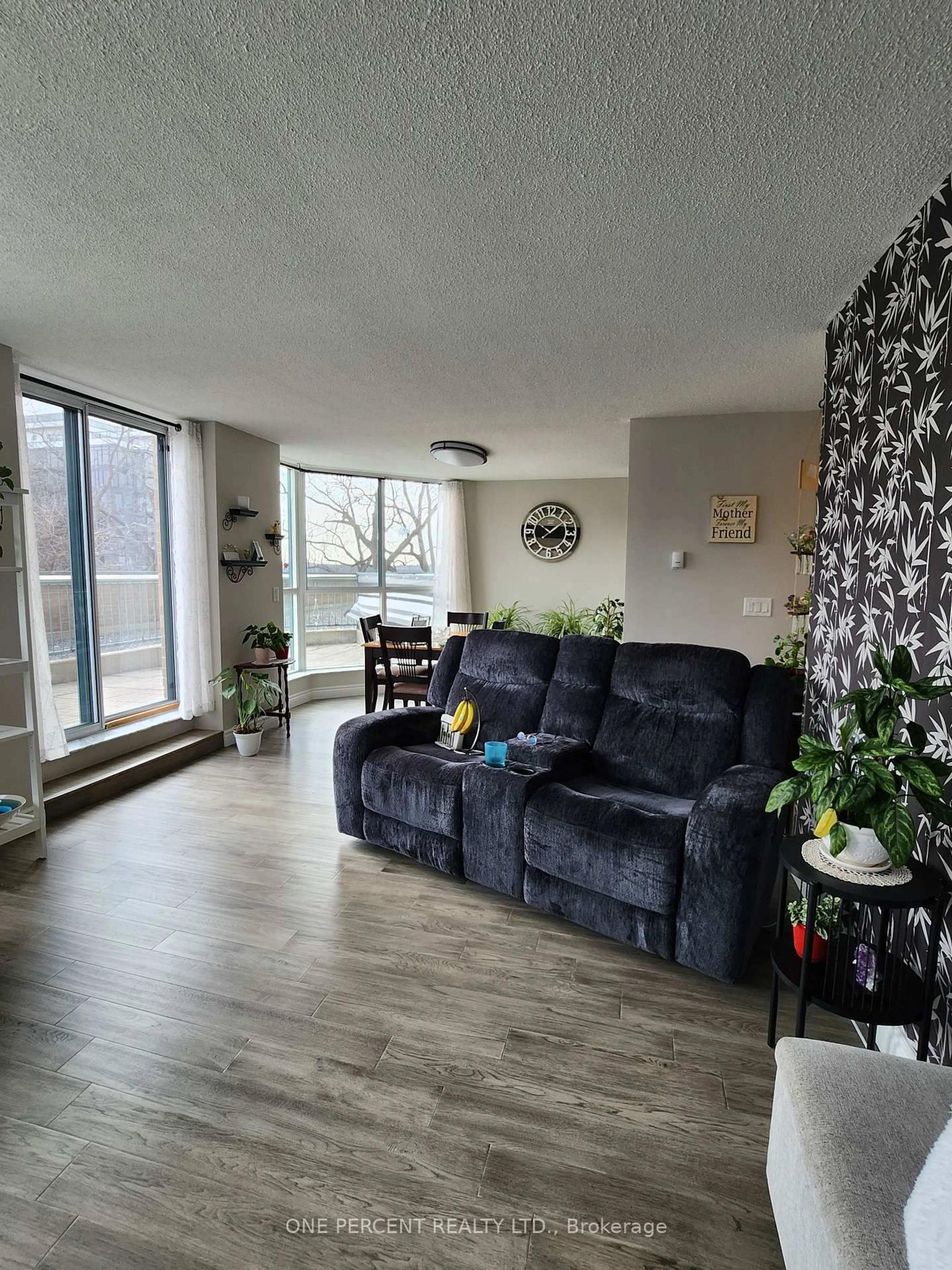Living room with furniture, unknown for 150 Dunlop St #311, Barrie Ontario L4M 6H1