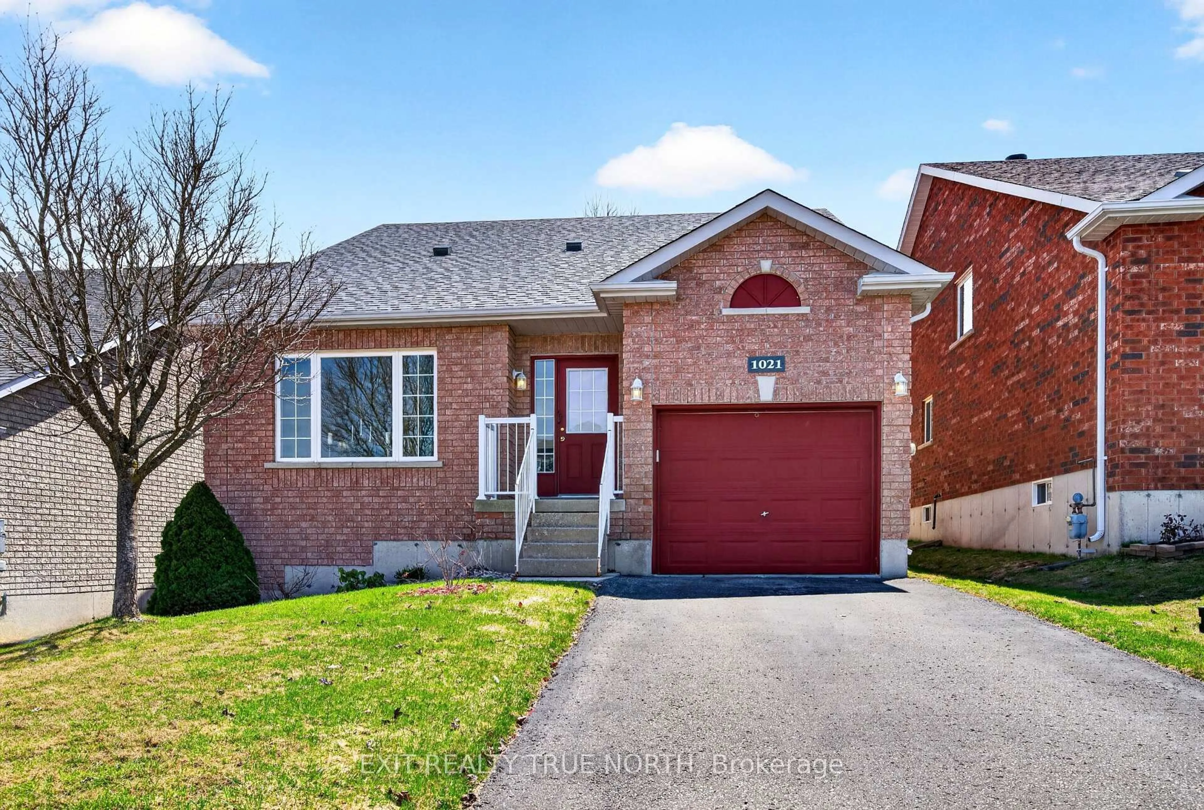 Home with brick exterior material, street for 1021 Whitney Cres, Midland Ontario L4R 5N3