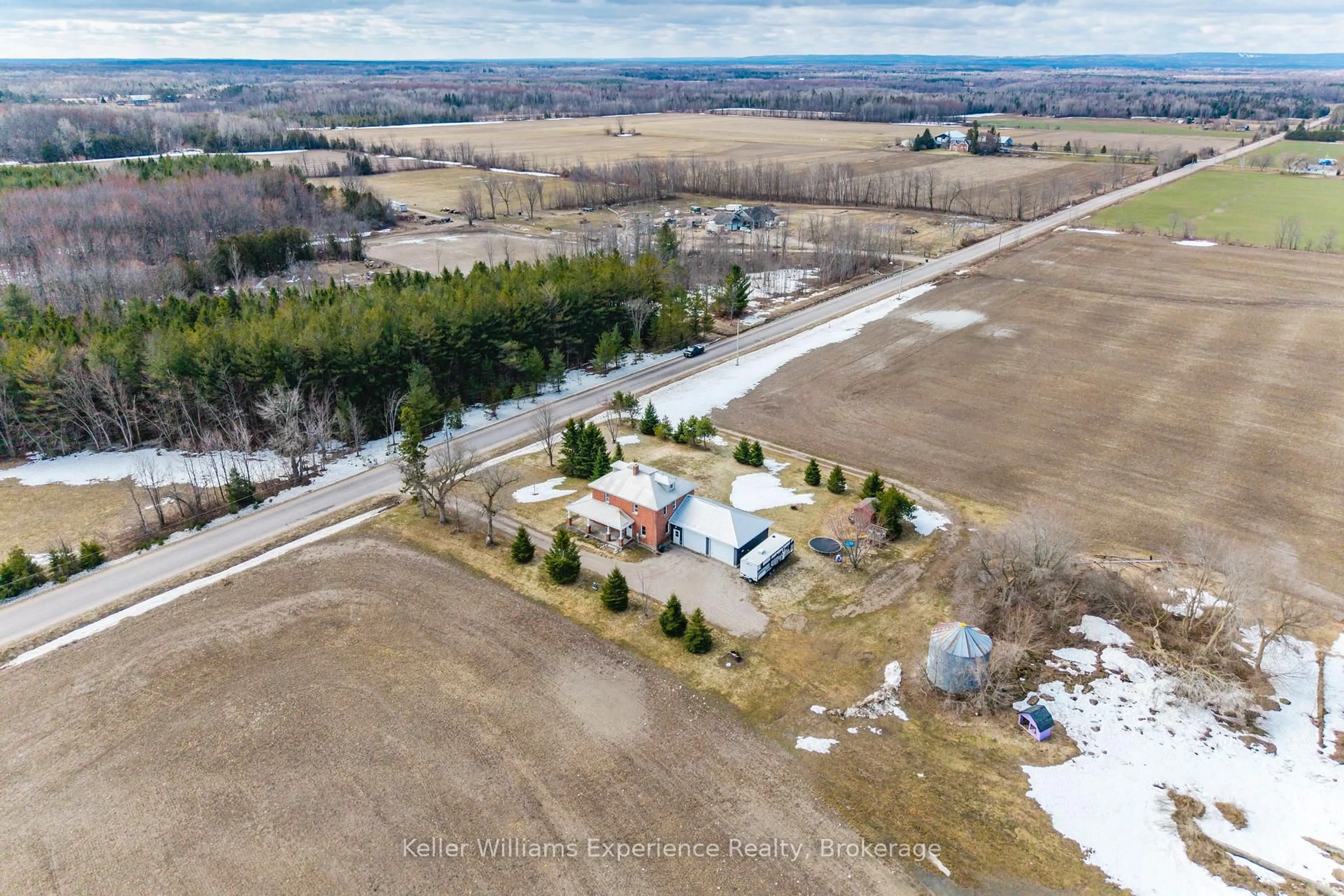 A pic from outside/outdoor area/front of a property/back of a property/a pic from drone, unknown for 2936 Flos 6 Rd, Springwater Ontario L0L 1P0