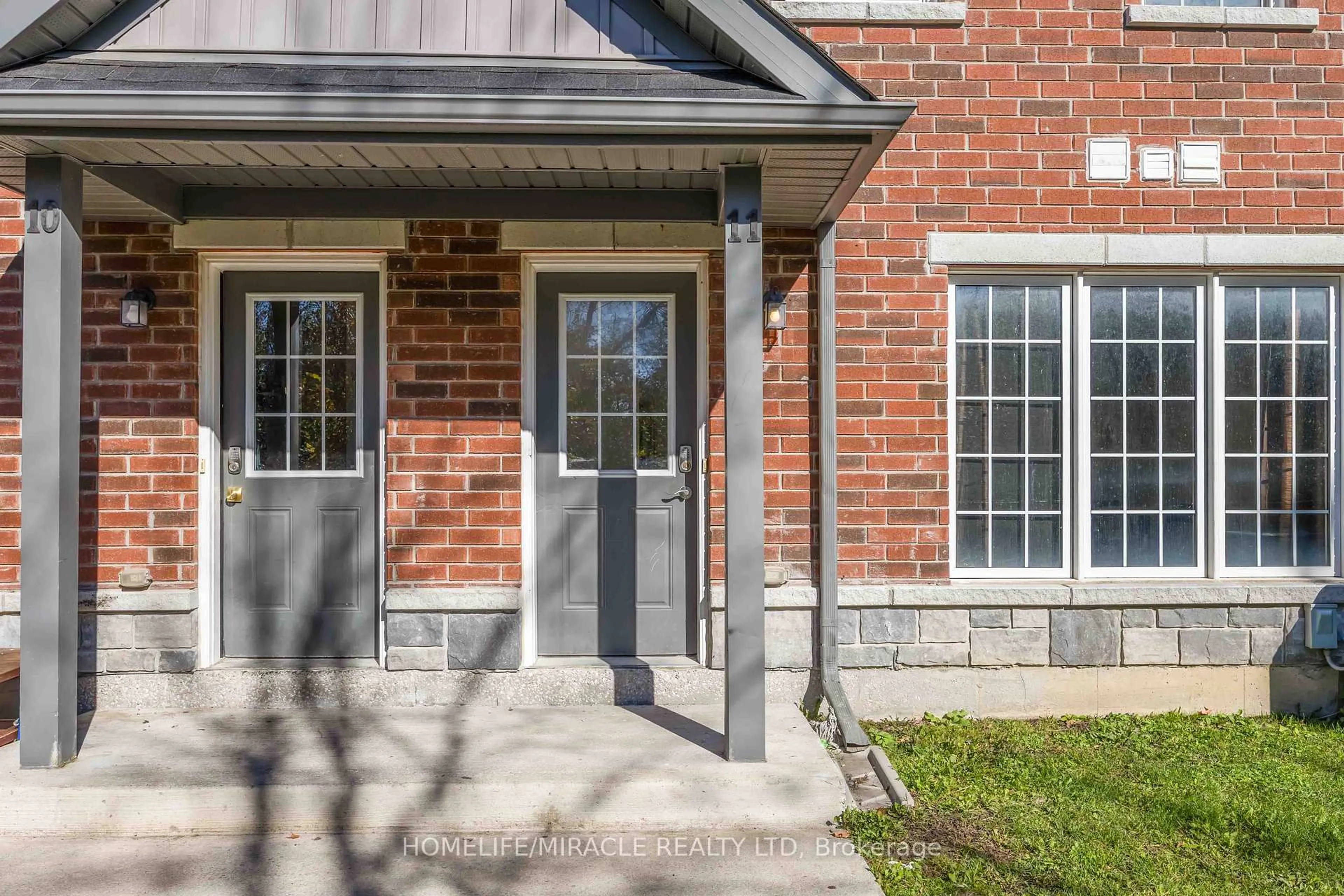 Home with brick exterior material, street for 244 Penetanguishene Rd #11, Barrie Ontario L4M 7C2