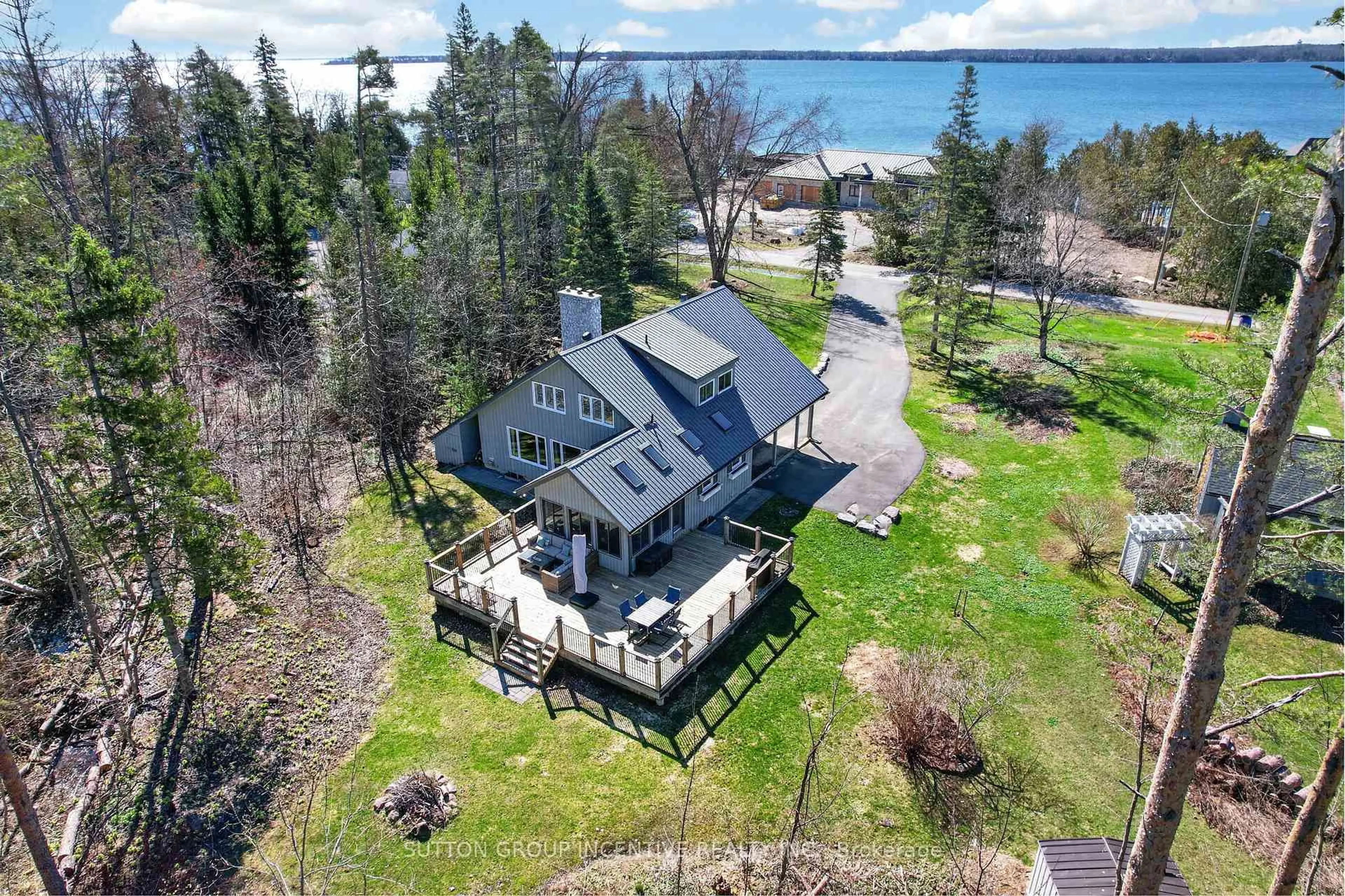 A pic from outside/outdoor area/front of a property/back of a property/a pic from drone, water/lake/river/ocean view for 24 Brambel Rd, Oro-Medonte Ontario L0L 2L0