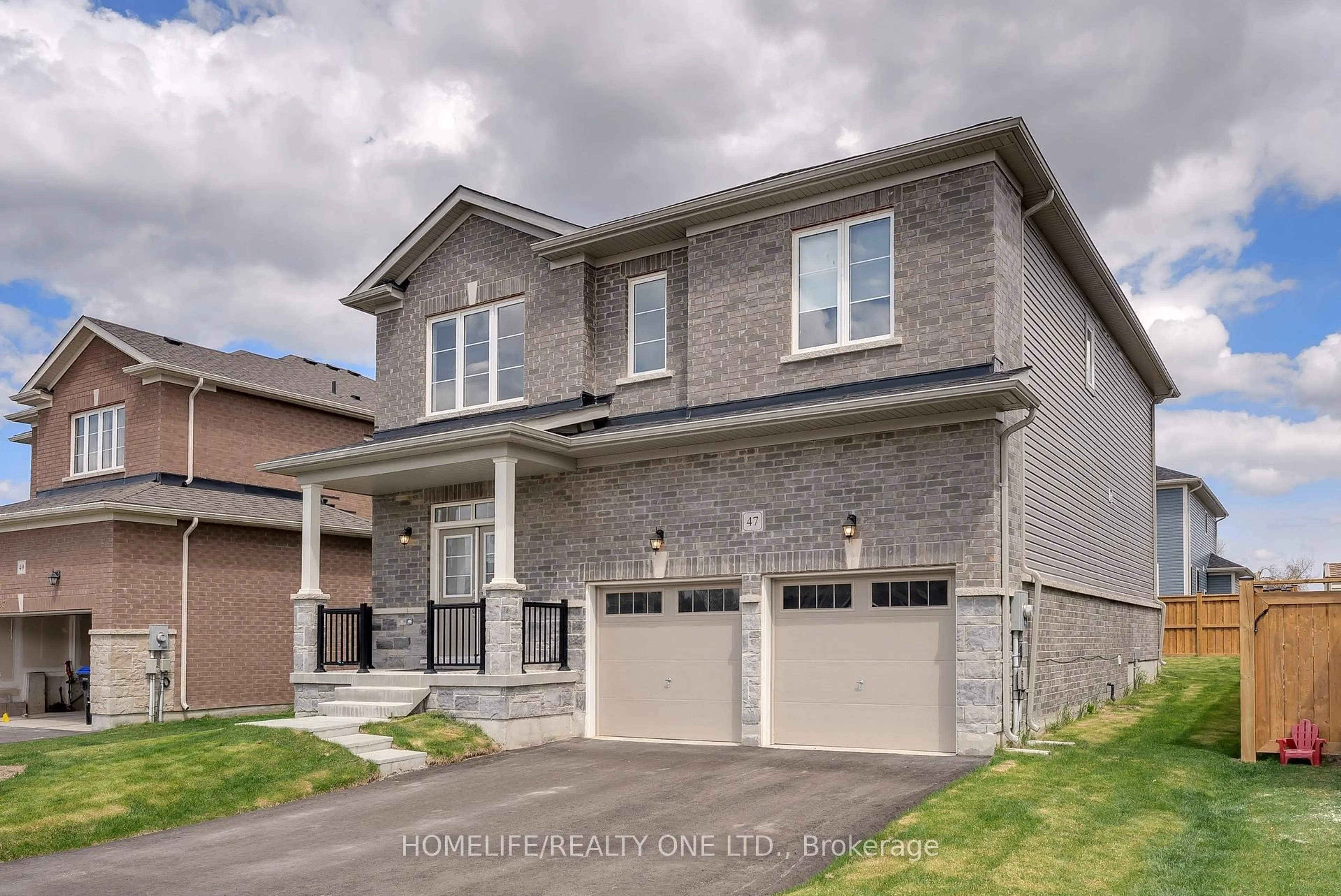 Home with brick exterior material, street for 47 Autumn Dr, Wasaga Beach Ontario L9Z 0K7