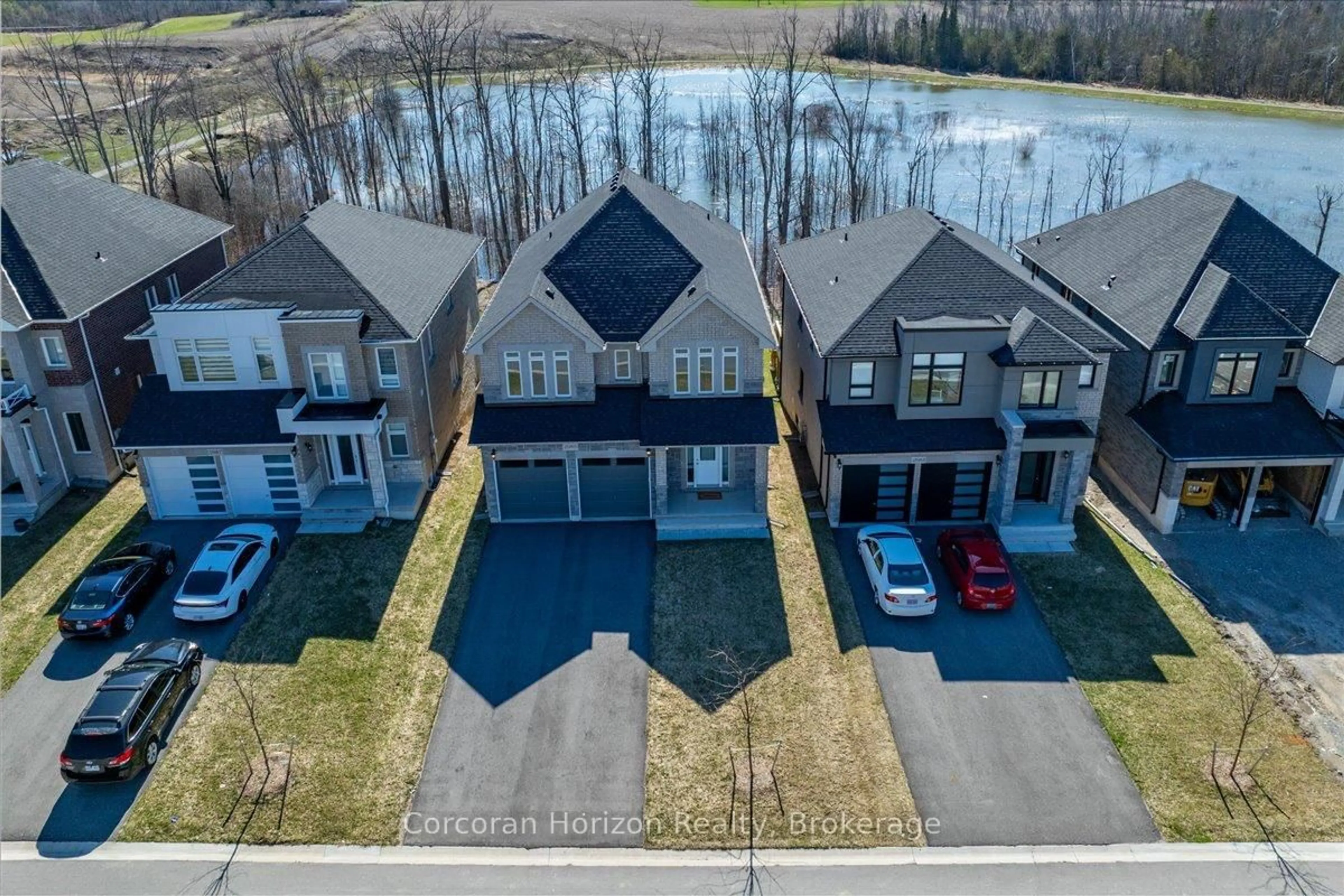 A pic from outside/outdoor area/front of a property/back of a property/a pic from drone, water/lake/river/ocean view for 2985 Monarch Dr, Orillia Ontario L3V 8M7