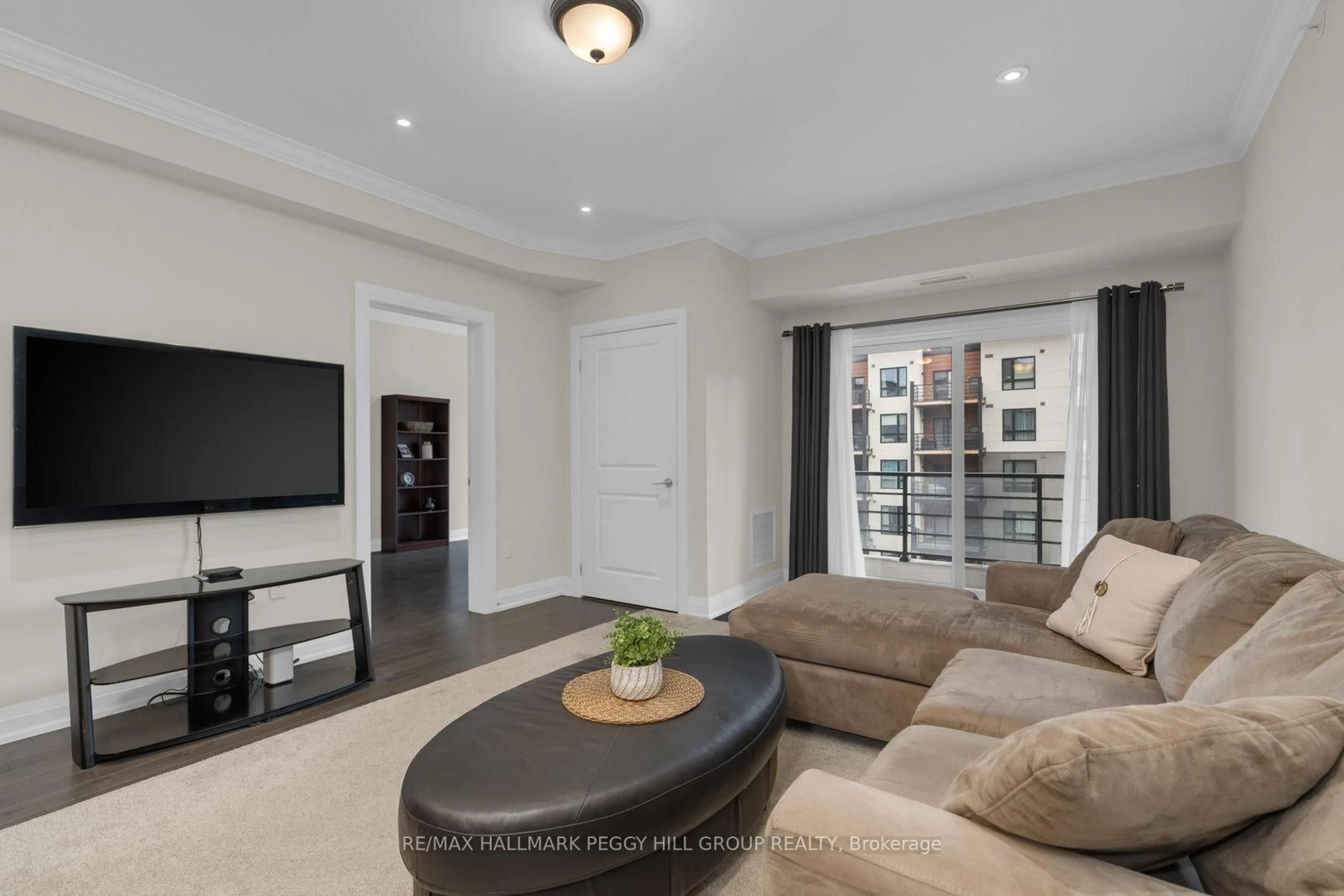 Living room with furniture, unknown for 306 Essa Rd #407, Barrie Ontario L9J 0H5