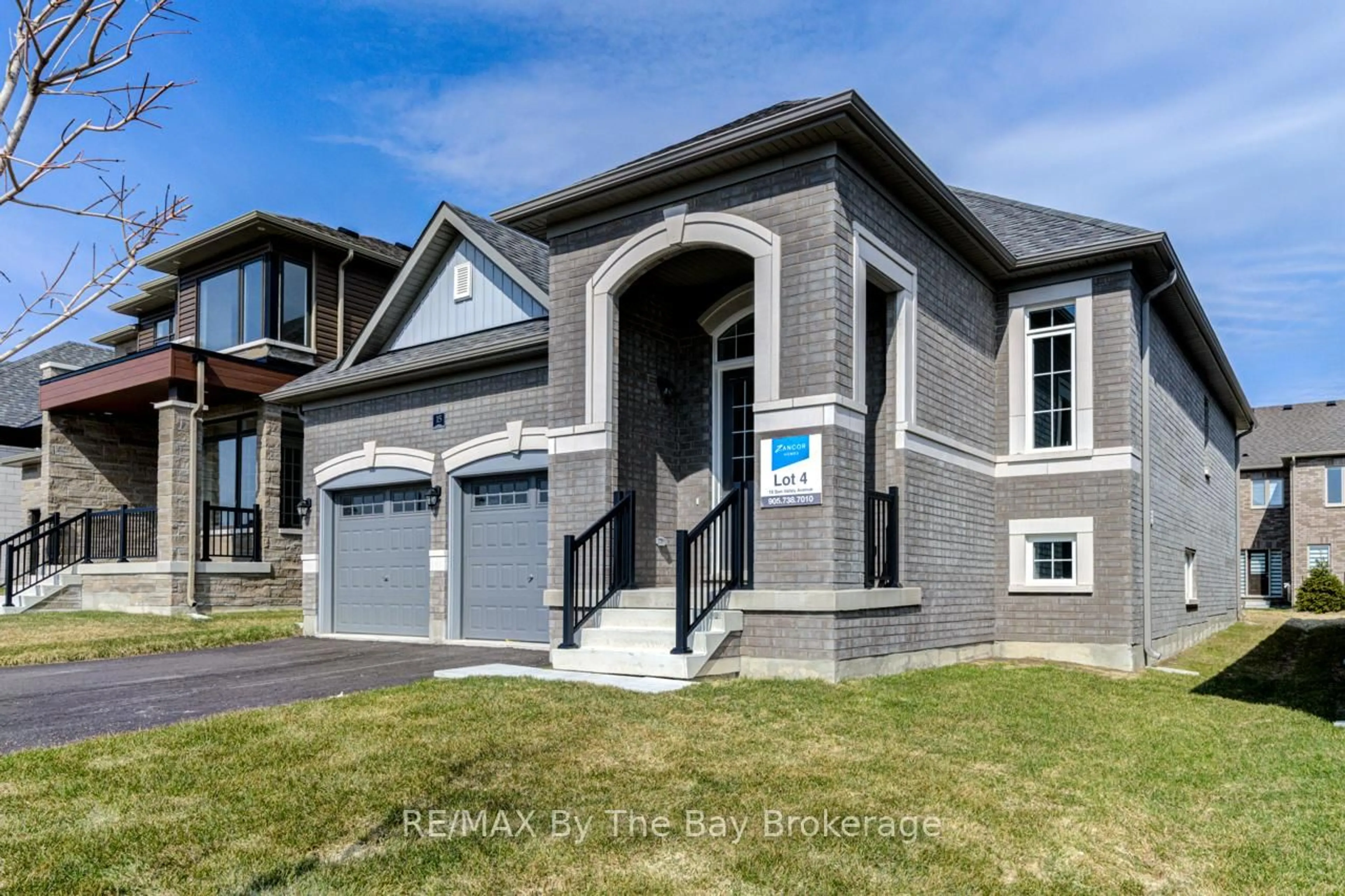 Home with brick exterior material, street for 15 Sun Valley Ave, Wasaga Beach Ontario L9Z 0N6