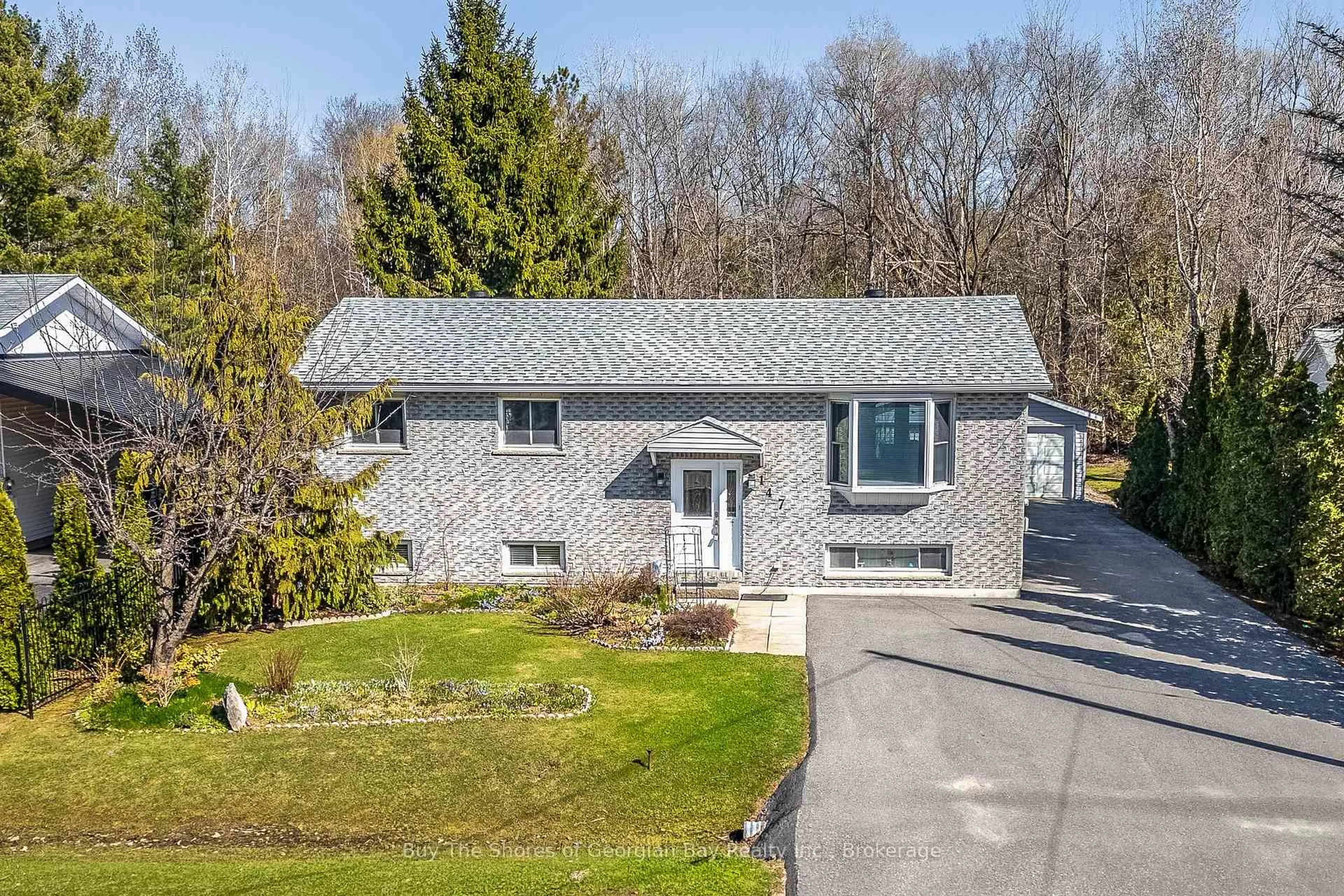 A pic from outside/outdoor area/front of a property/back of a property/a pic from drone, street for 147 Lumber Rd, Tay Ontario L0K 2A0