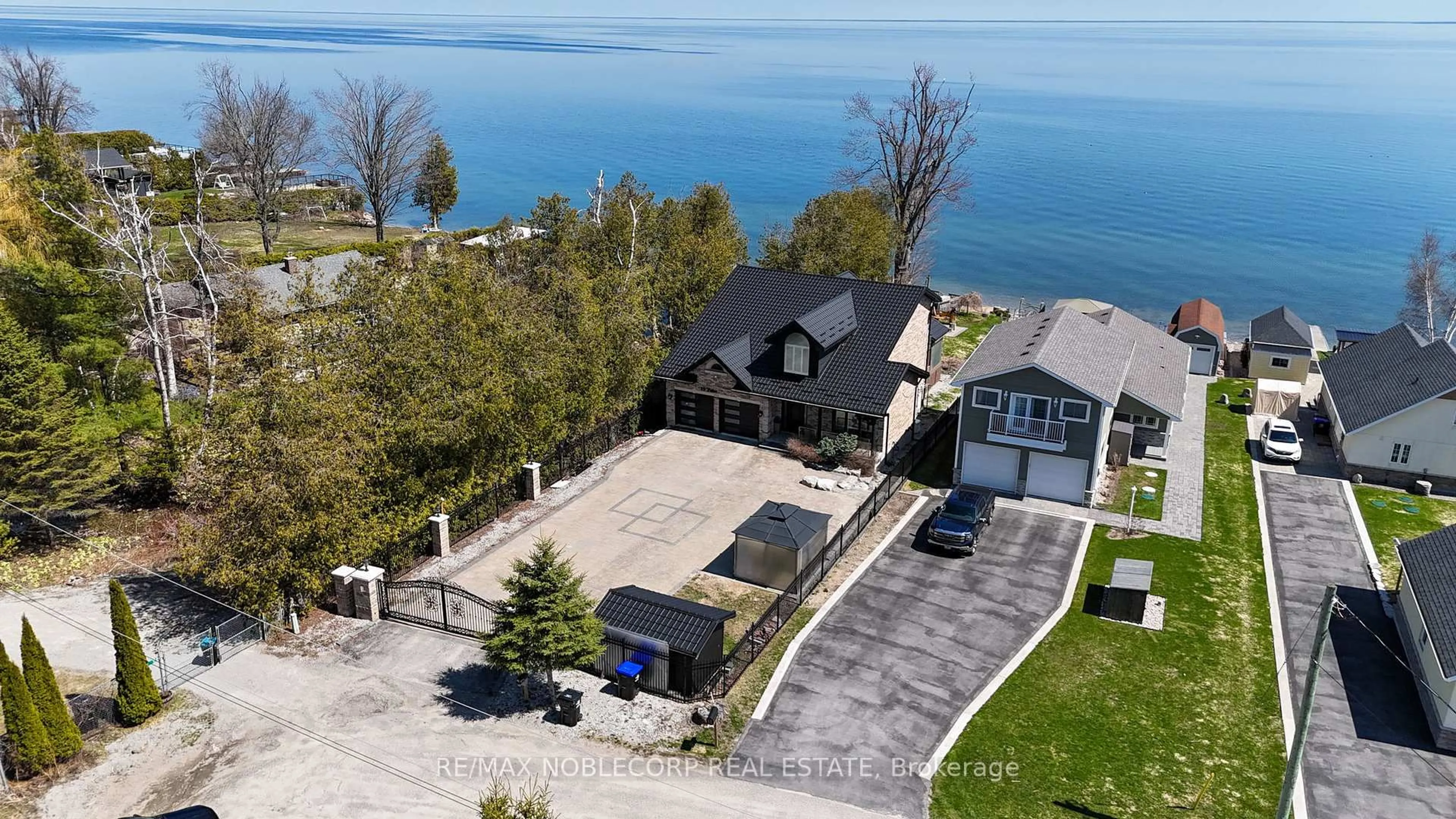 A pic from outside/outdoor area/front of a property/back of a property/a pic from drone, water/lake/river/ocean view for 15 Palm Beach Rd, Oro-Medonte Ontario L0L 1T0